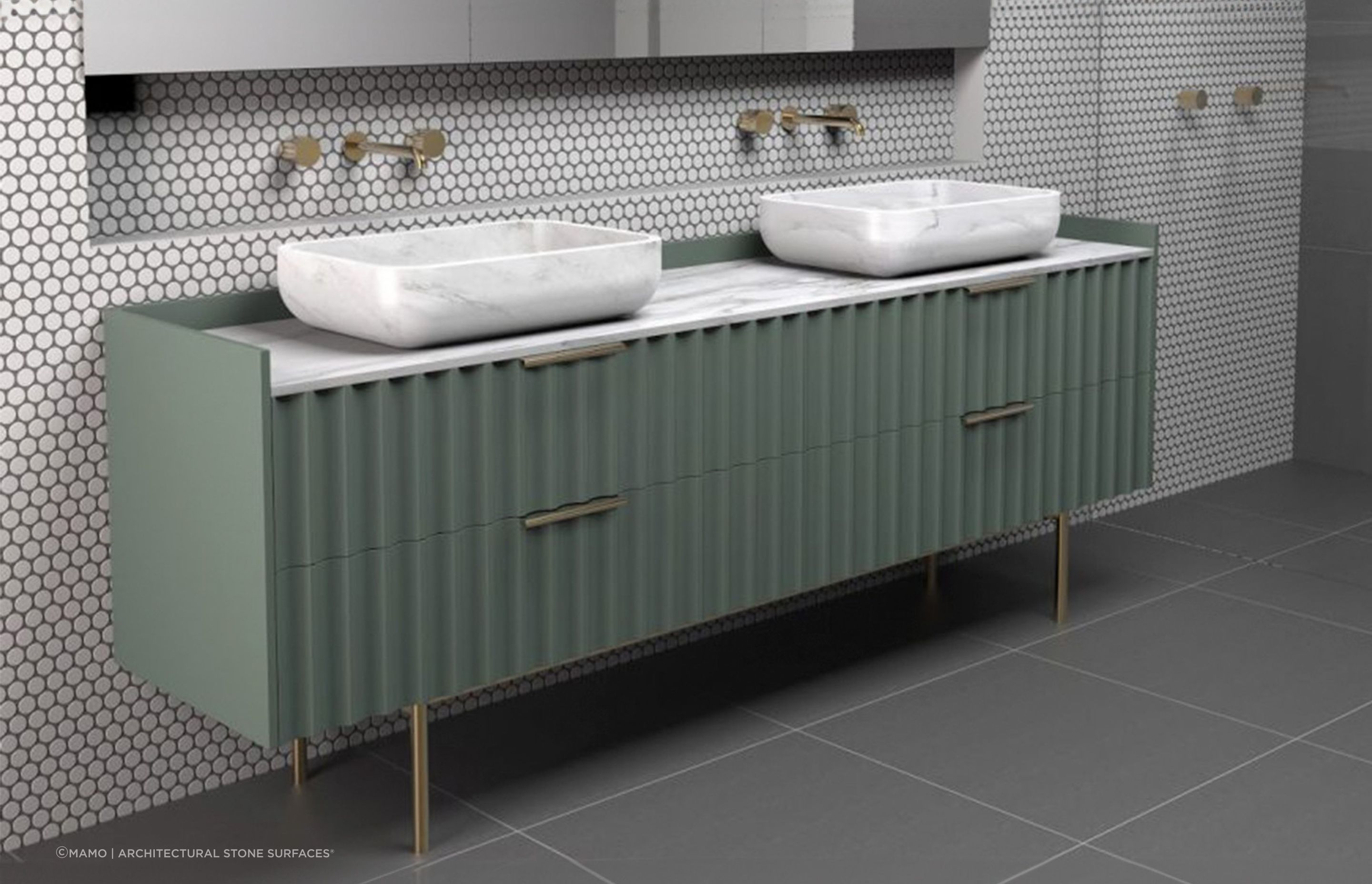 Shades of green can bring a natural aesthetic to your bathroom, seen here with the Seta Vanity by MAMO | Architectural Stone Surfaces®.