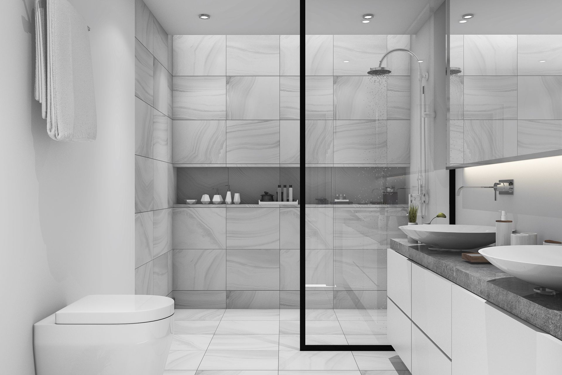 A walk-in shower allows you to seamlessly move into your shower, seen here and complemented by a quality glass panel by Stake Glass.