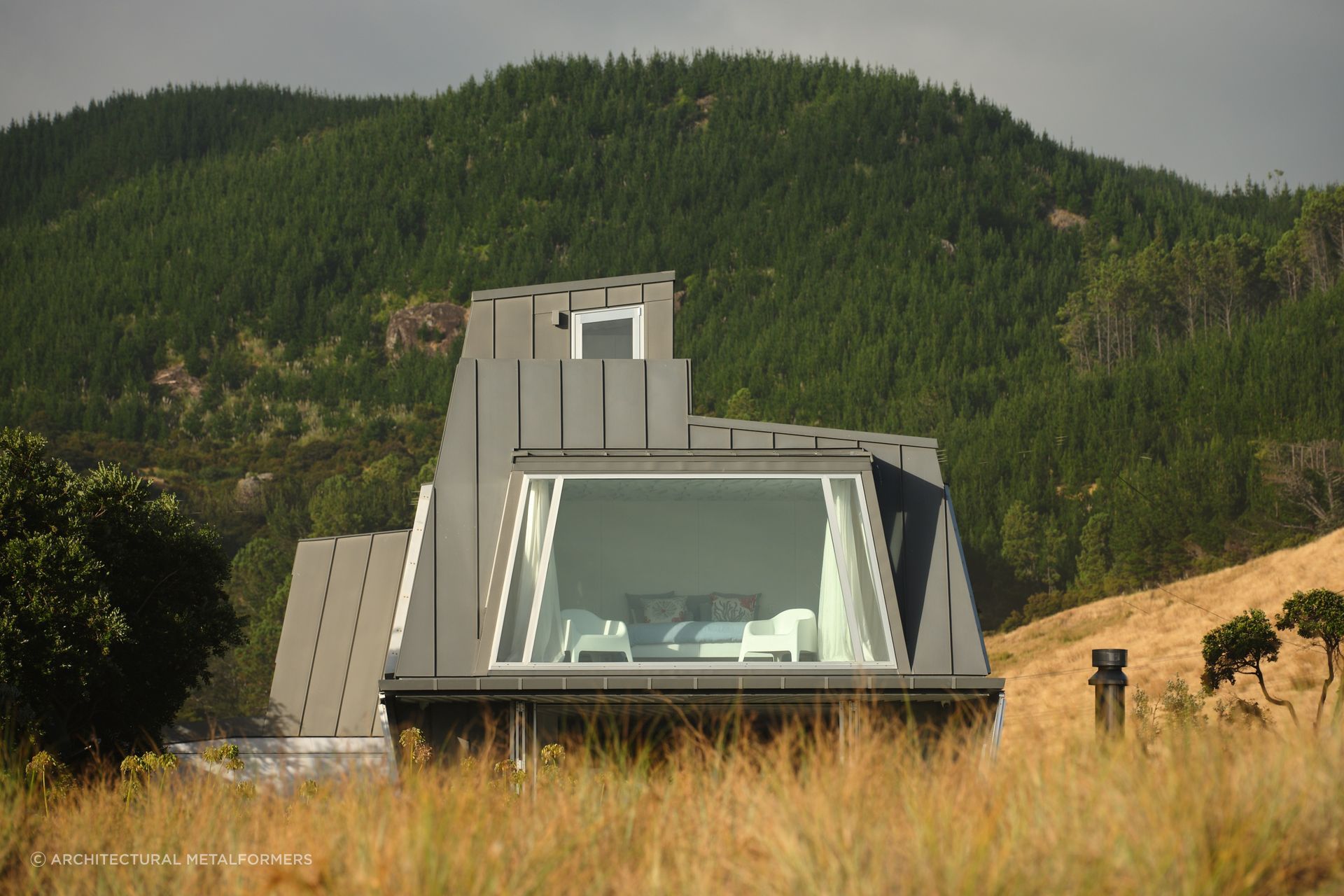 Stylish use of Smart Tray Standing Seam Metal Cladding from Architectural Metalformers.