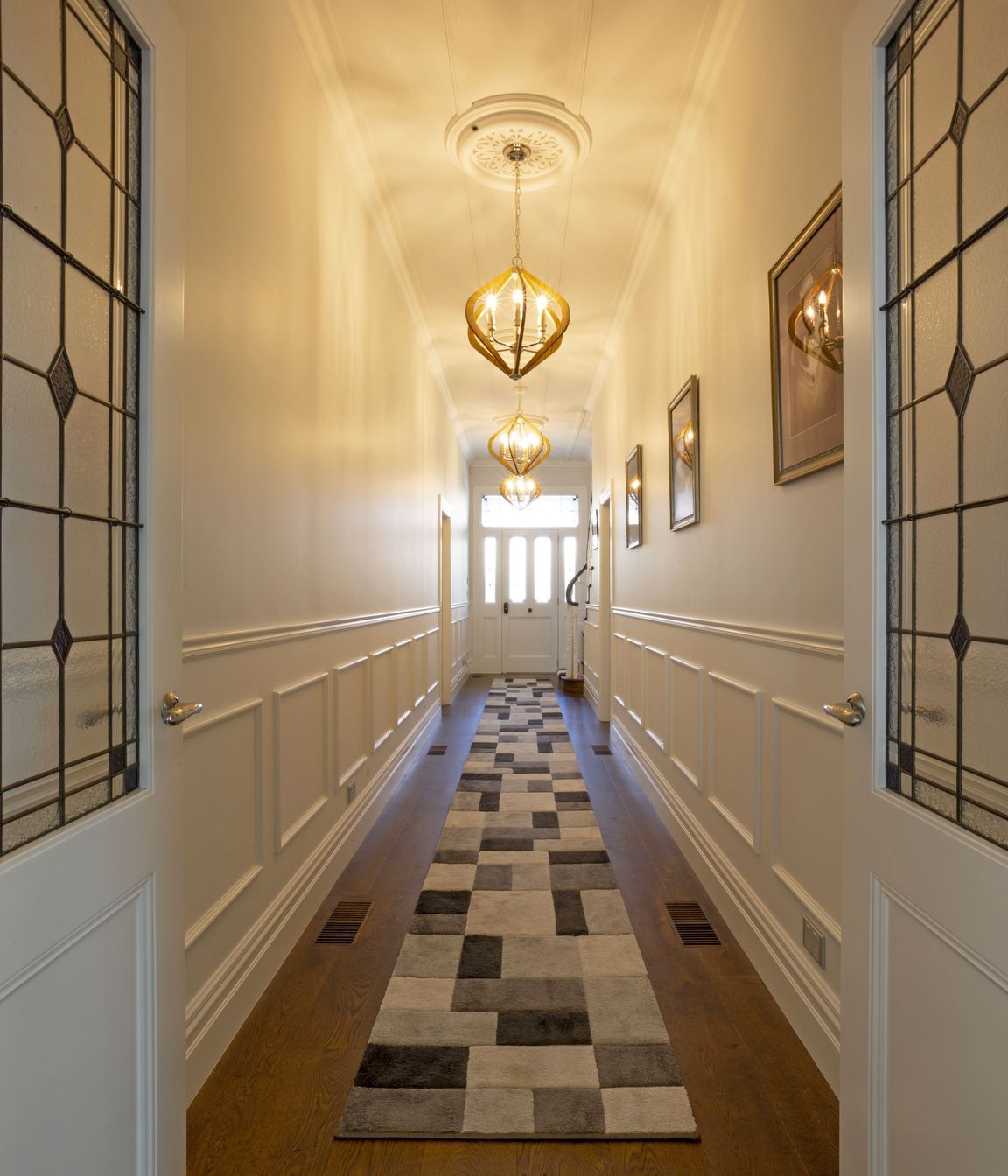 Combining modern flooring with character panelling and leadlights creates the perfect balance of old and new.