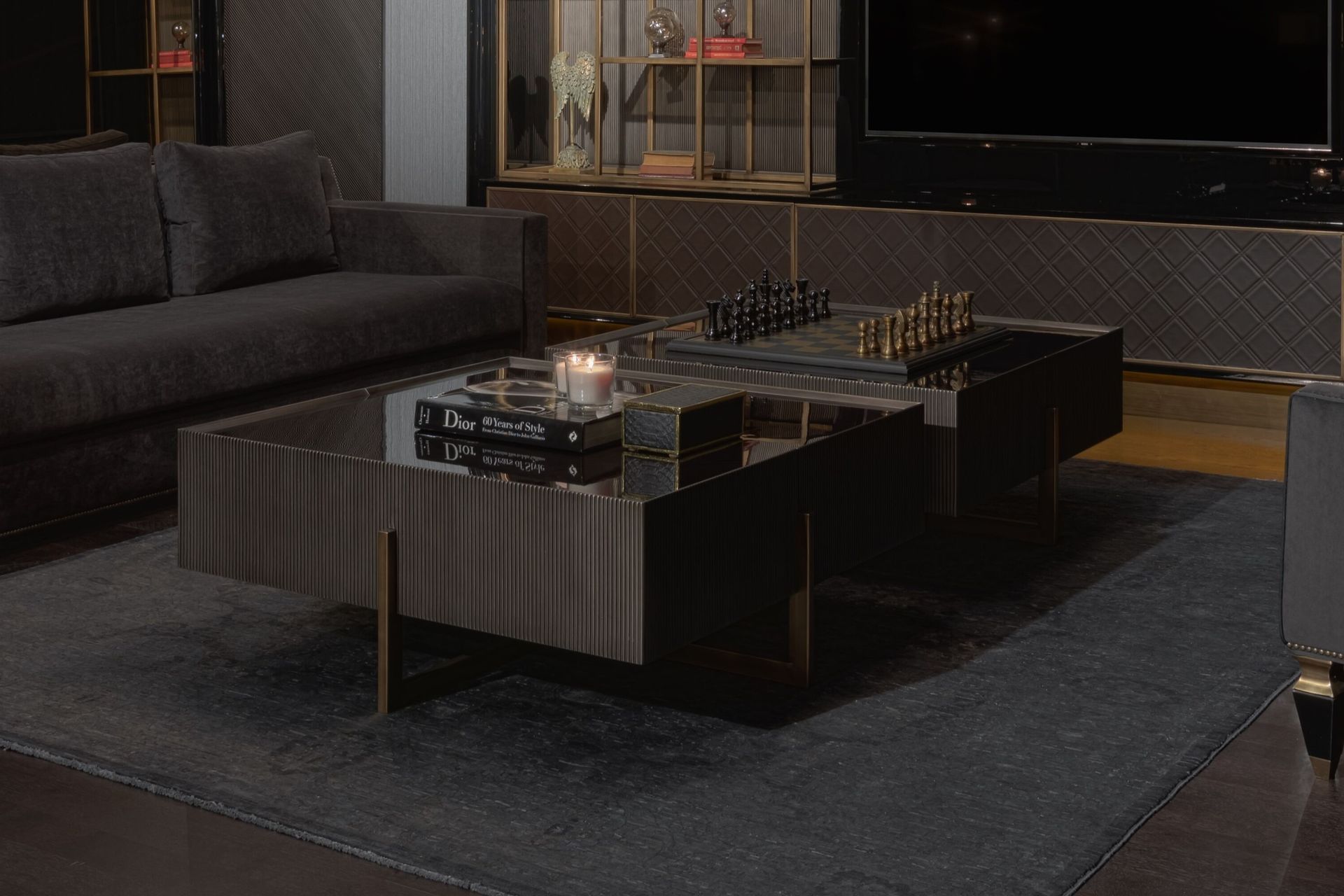 The luxurious Stone Coffee Table is complemented with an equally divine chess set, completing a sophisticated setting.