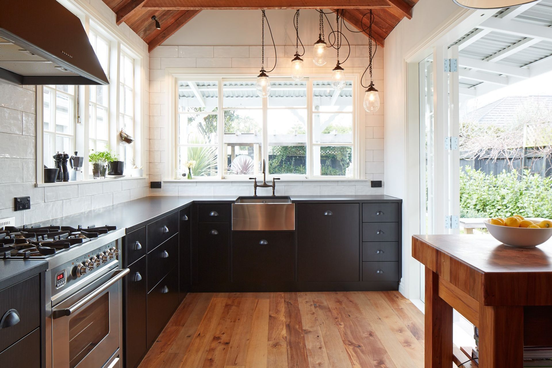 Cup handles are perfect for a rustic kitchen with a relaxing vibes as seen here in this award-winning kitchen by Ingrid Geldof Design.