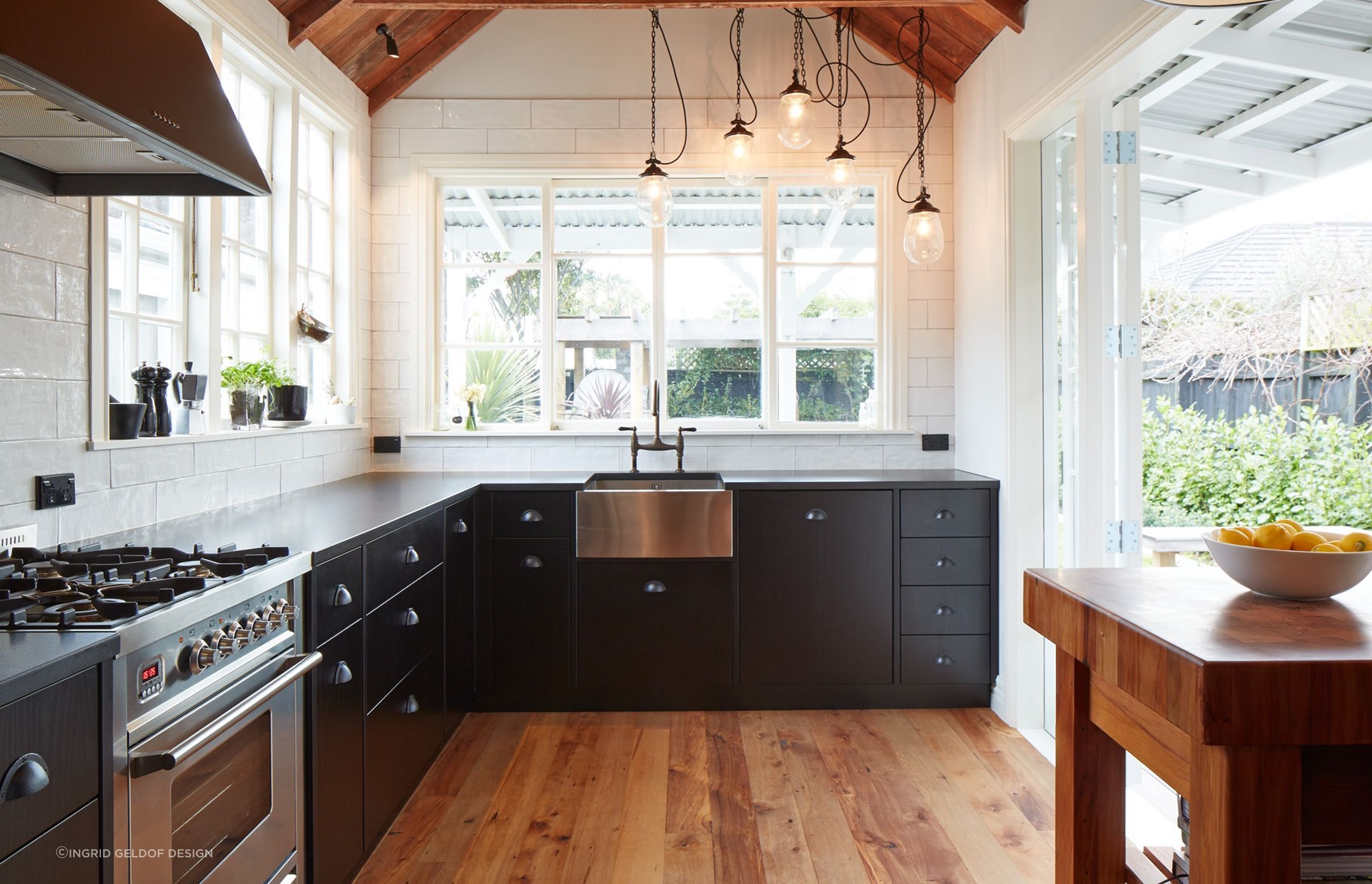 Cup handles are perfect for a rustic kitchen with a relaxing vibes as seen here in this award-winning kitchen by Ingrid Geldof Design.
