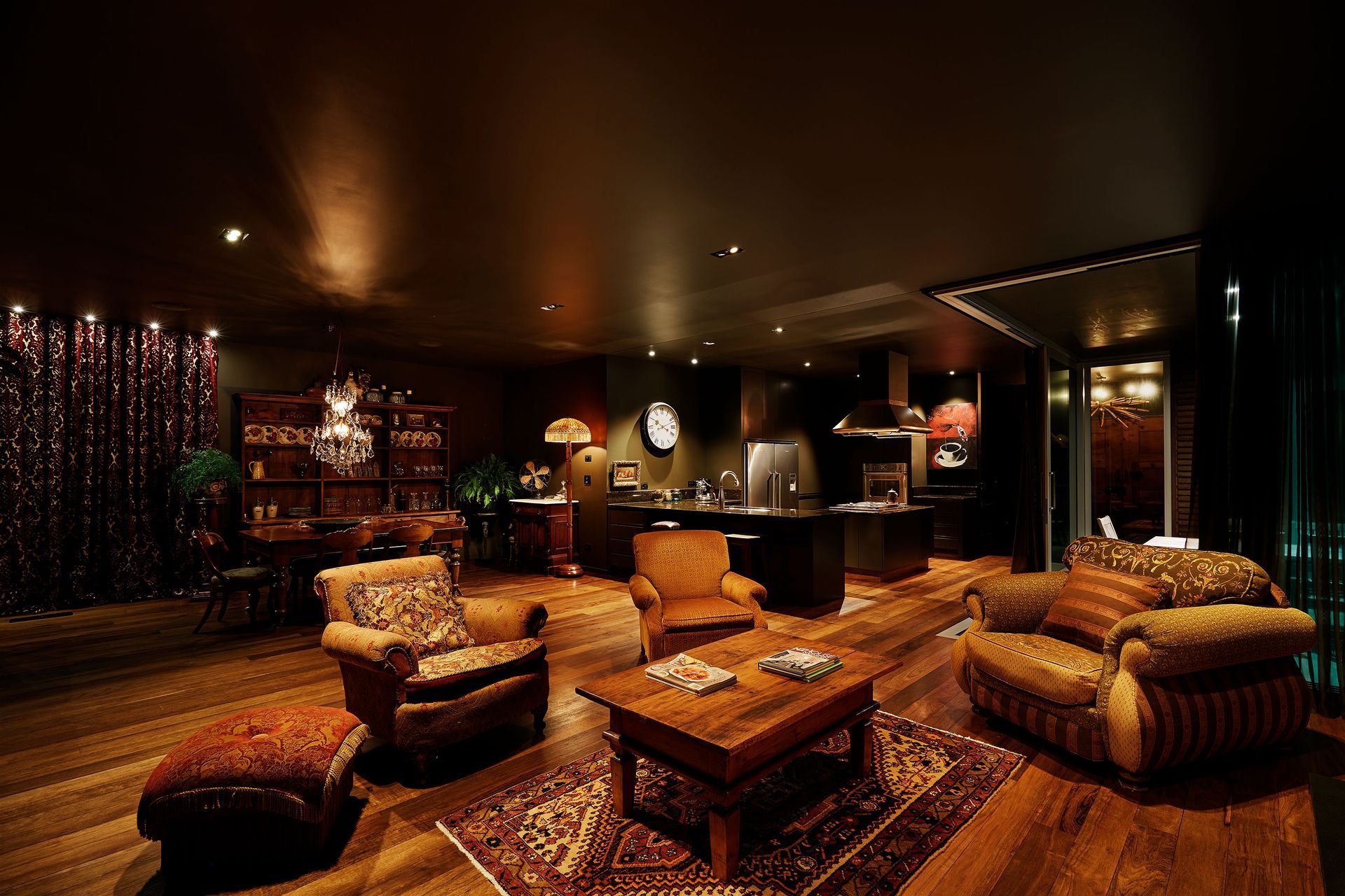 Layered lighting creates a cosy, soft ambience in this living room.