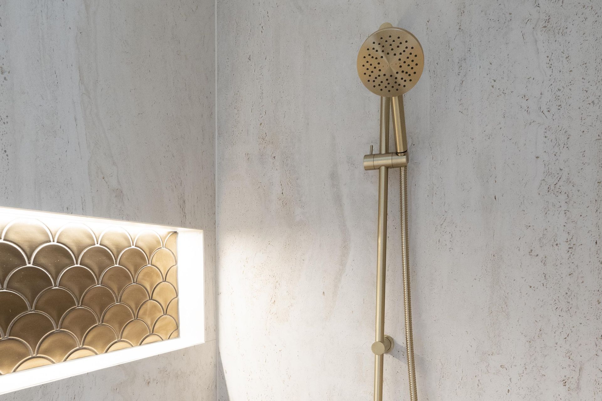 There are options available at every price point, like this very reasonable Tate Aerlux® Single Spray Slide Shower with high-end aesthetics.