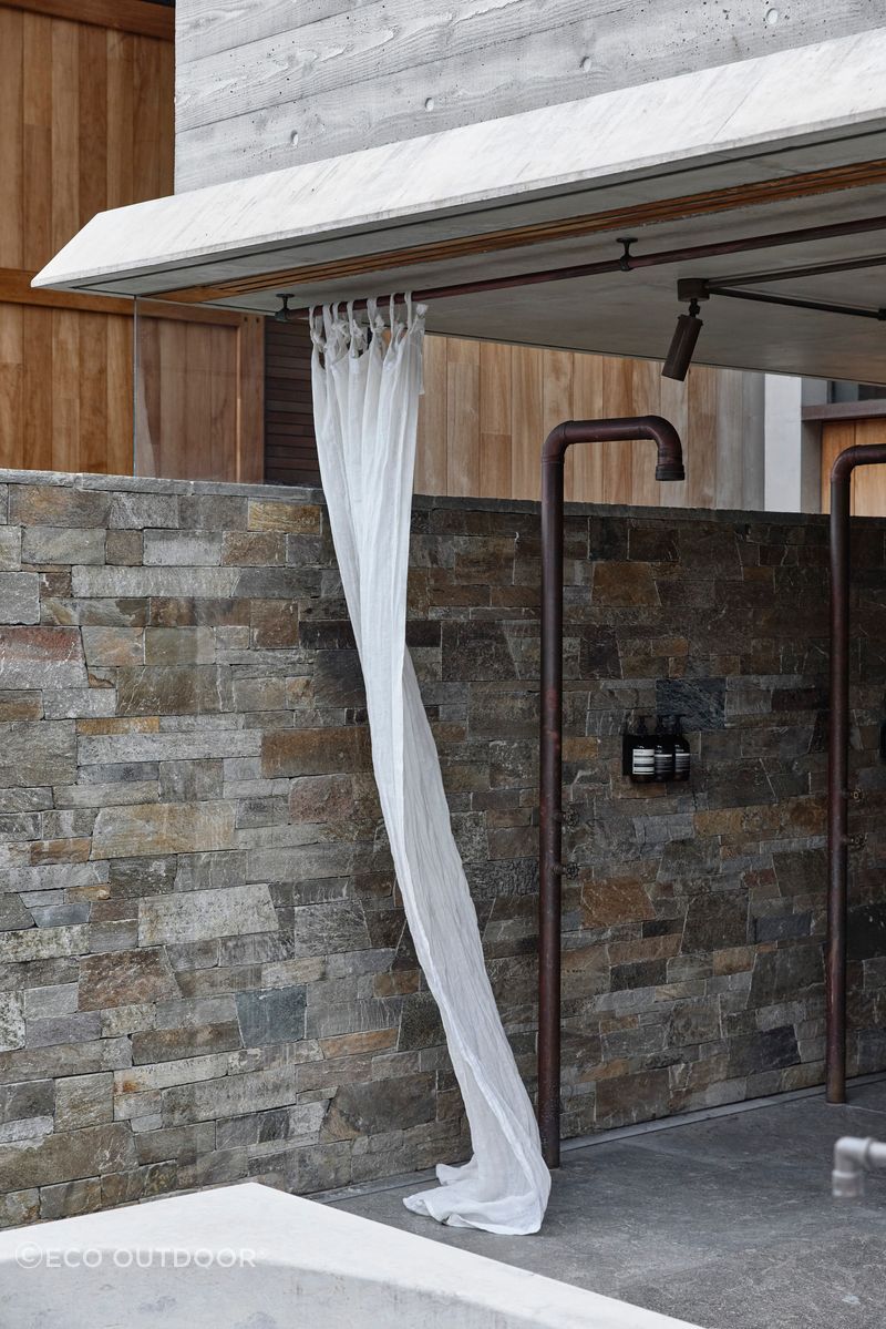 Outdoor shower at Backdune House featuring Baw Baw Dry Stone.
