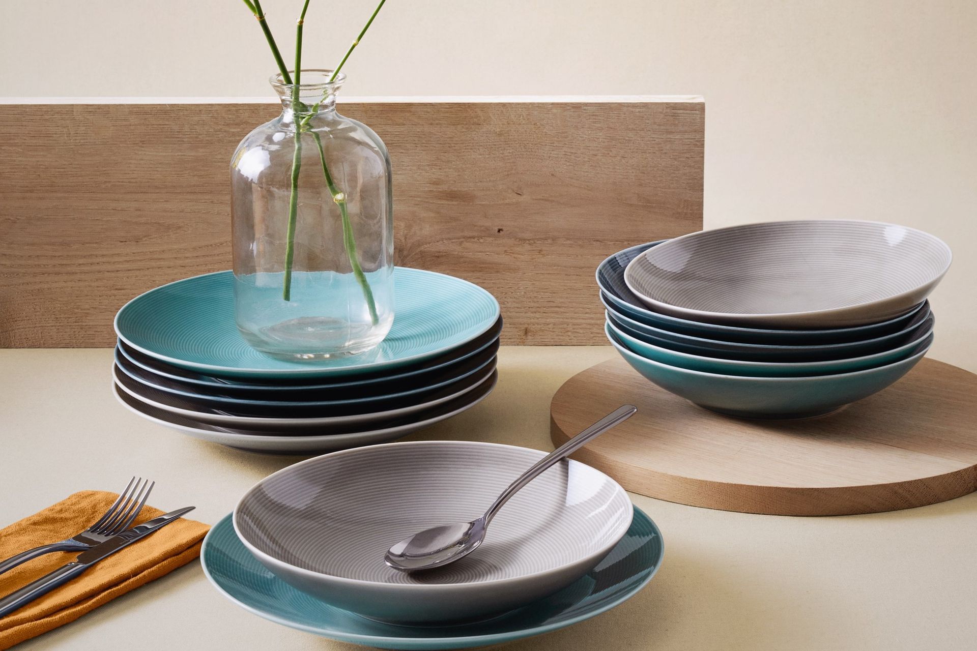 Your dinnerware should complement your dining room decor in colour, shape and style, seen here with Loft Colours Dinnerware by The Studio of Tableware.