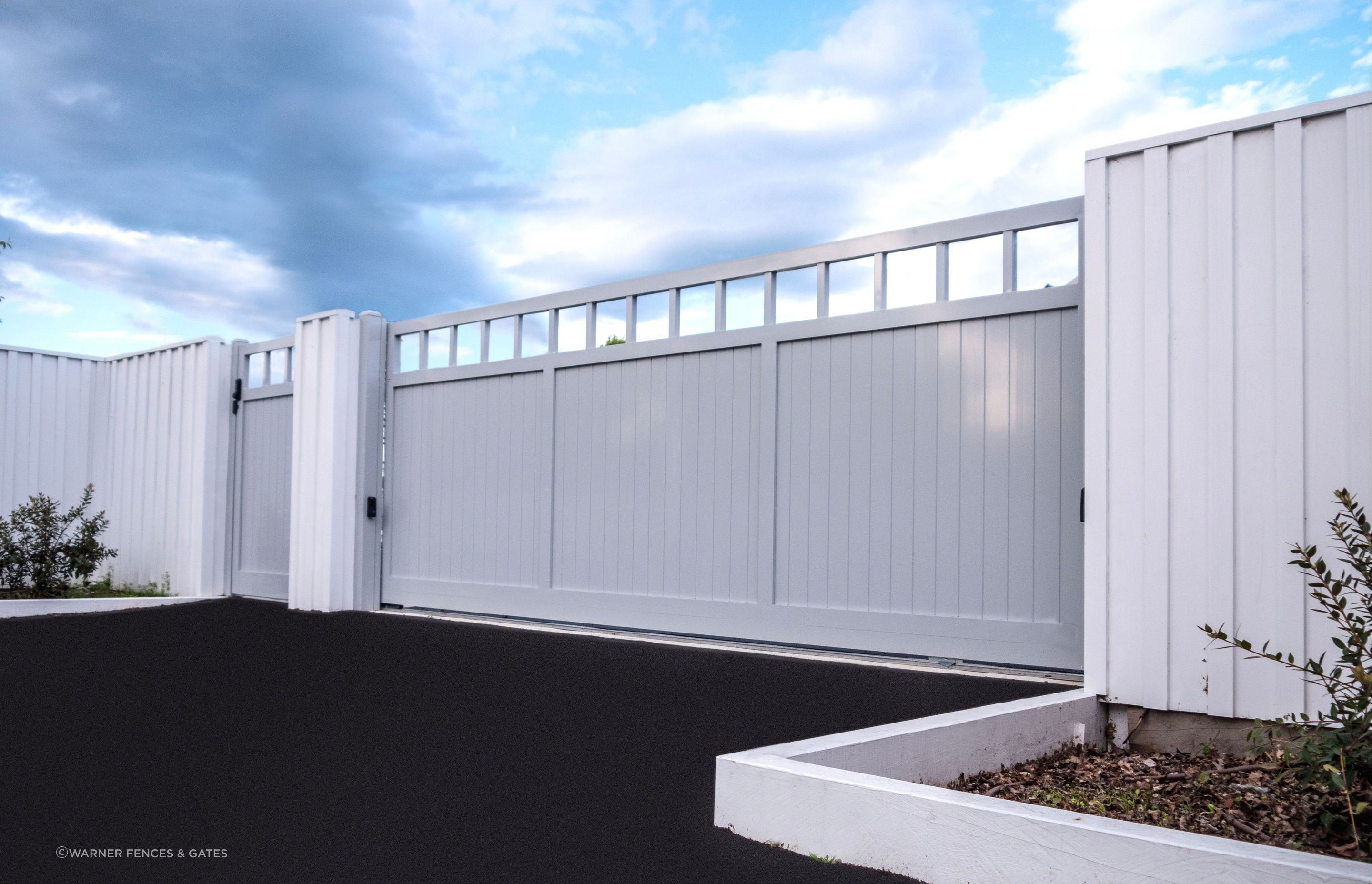This Tongue &amp; Groove Driveway Gate By Warner Fences &amp; Gates is made from quality powder-coated aluminium.