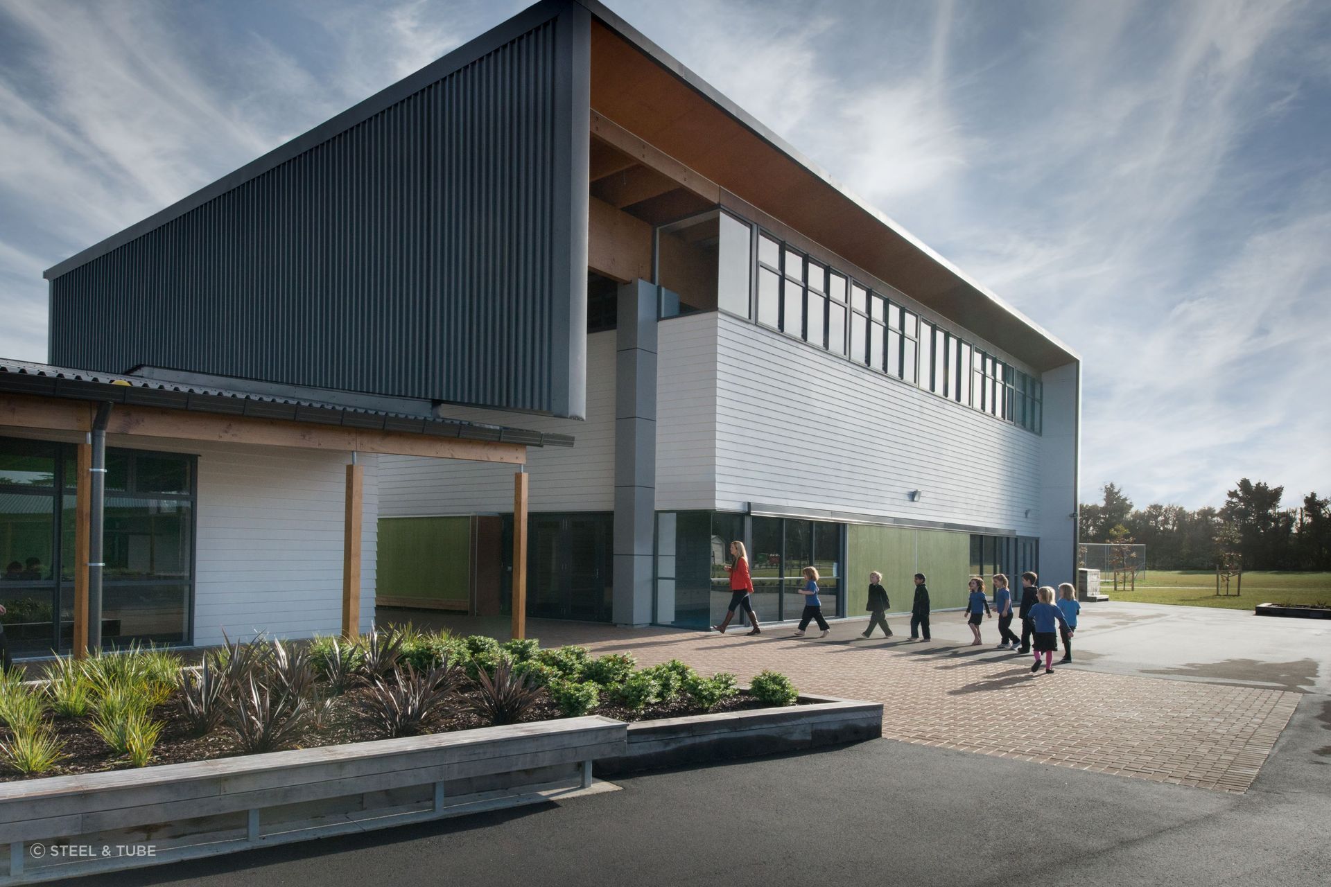 Trimline Roofing and its six-ribbed trapezoidal profile show its versatility in this school setting.