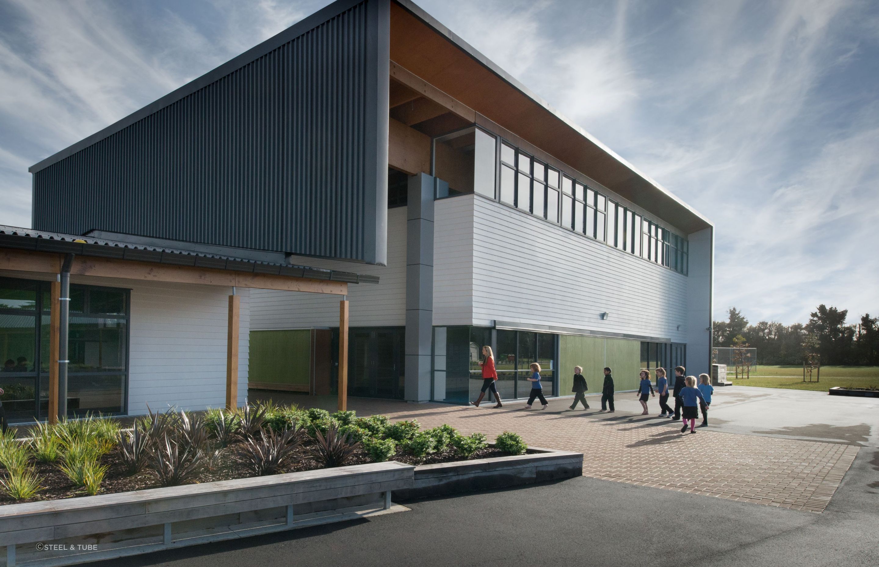 Trimline Roofing and its six-ribbed trapezoidal profile show its versatility in this school setting.