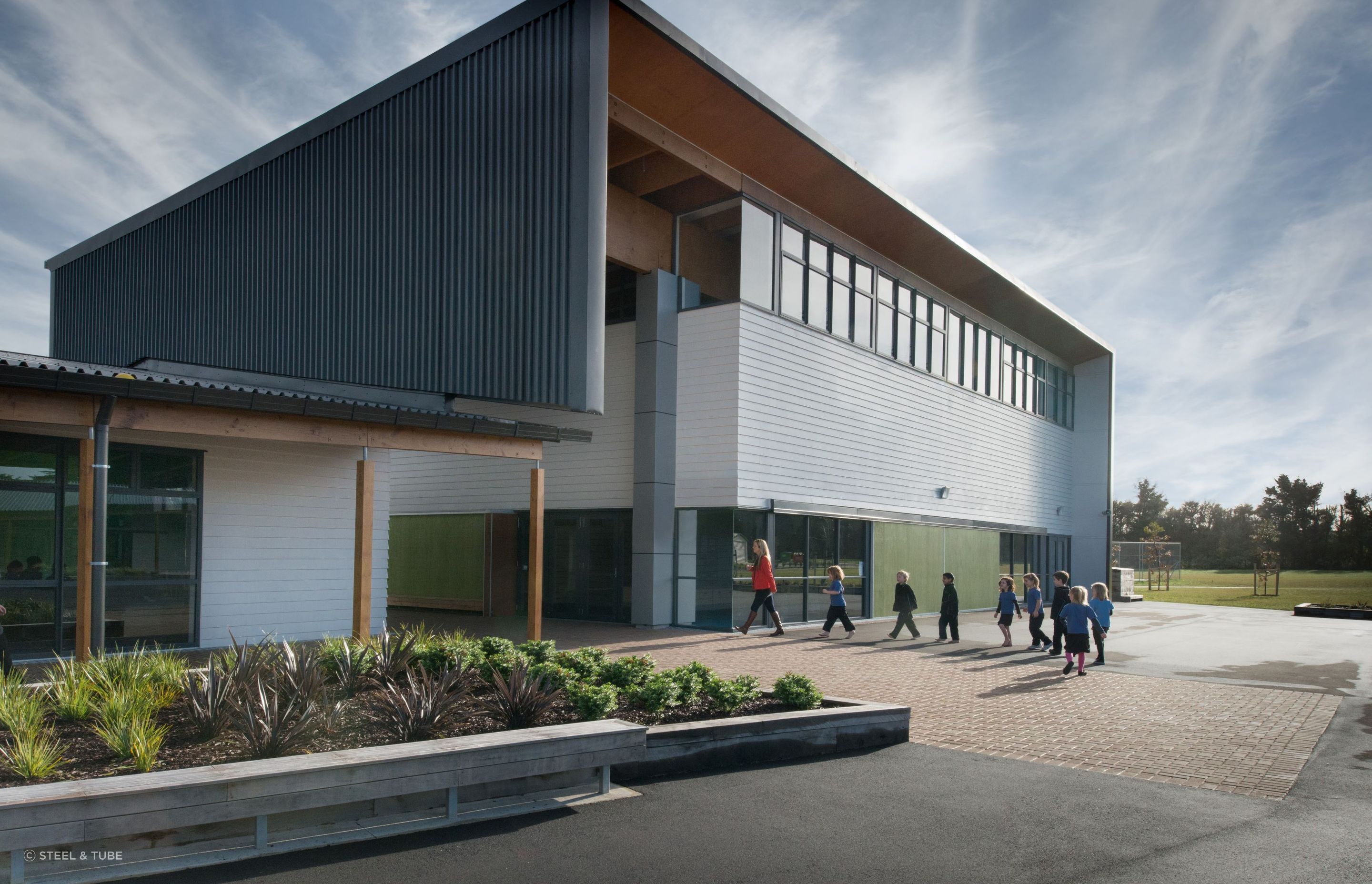 Trimline Roofing and its six-ribbed trapezoidal profile show its versatility in this school setting.
