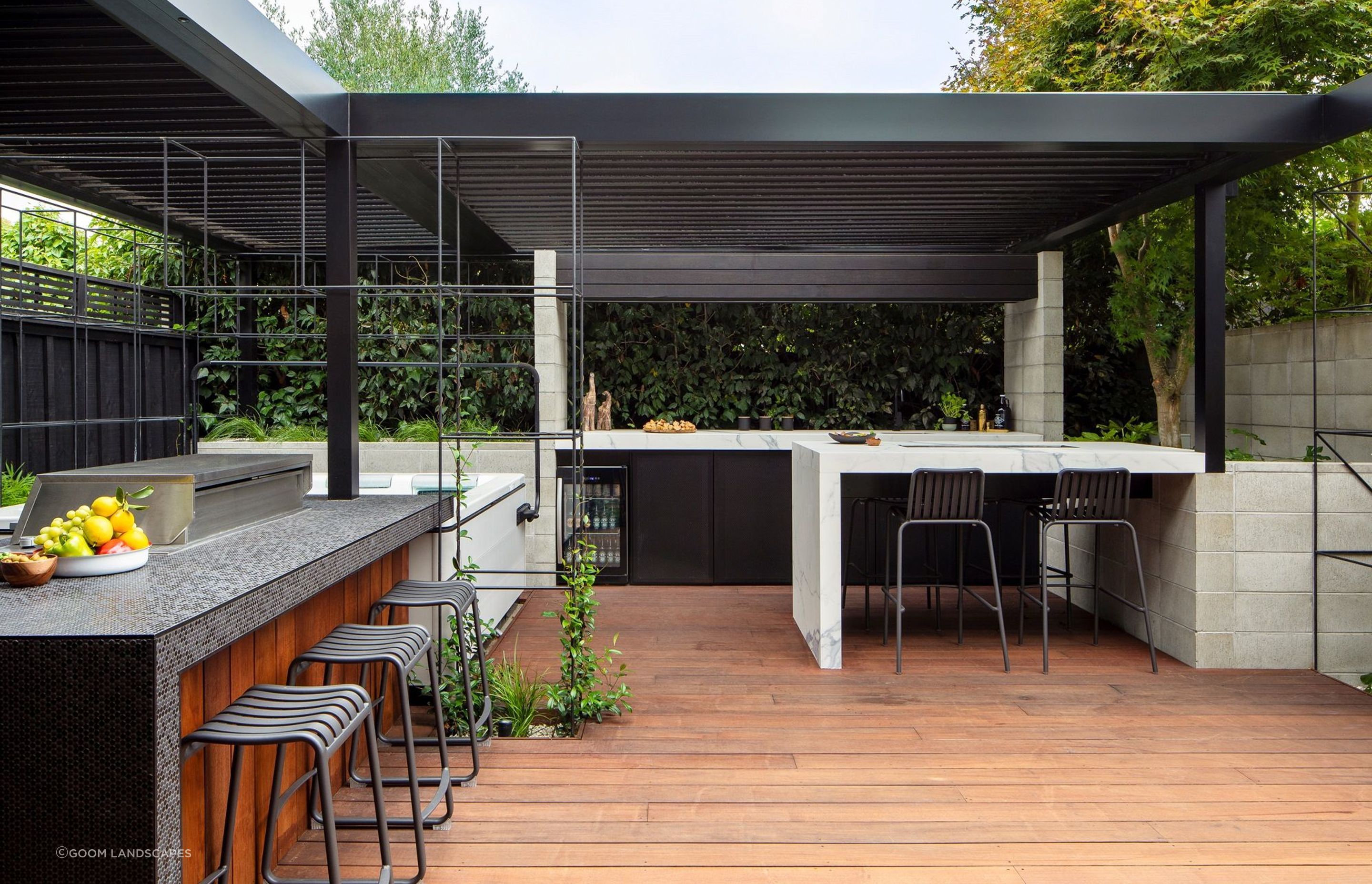 An outdoor kitchen like this can take the outdoor dining experience to another level.
