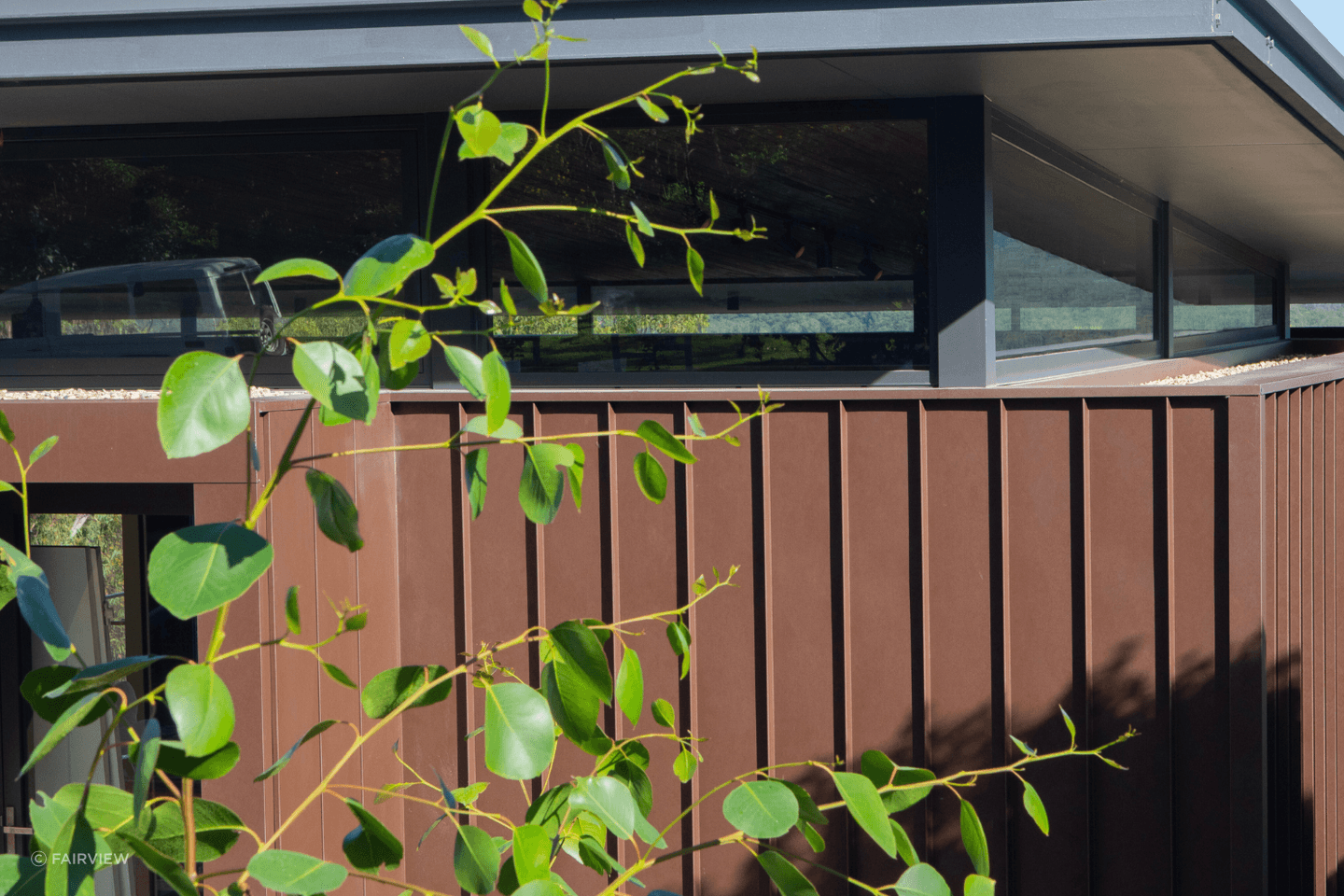 Formed steel cladding is available in a variety of patterned and woodgrain finishes. Featured product: Vitraloc - Roll Formed Steel Cladding.