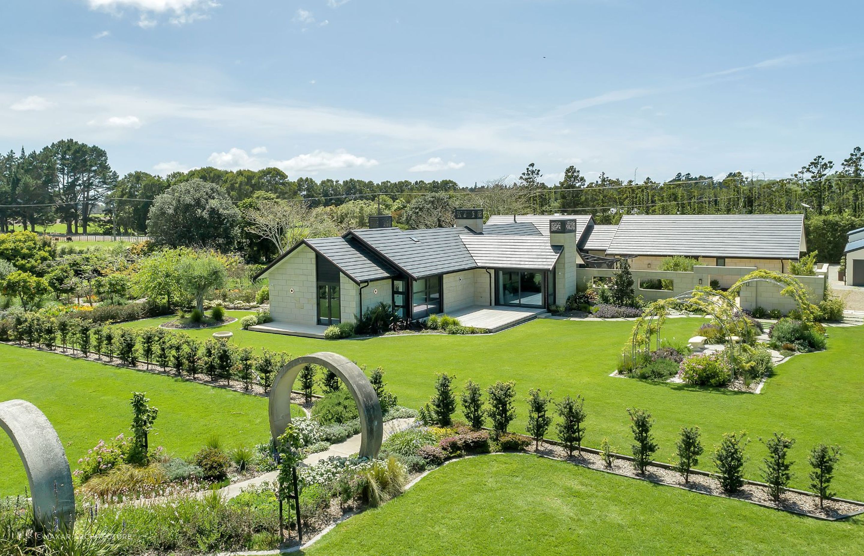 A beautiful rural home in Waipu has a striking look from above with Horizon Concrete Tiles.