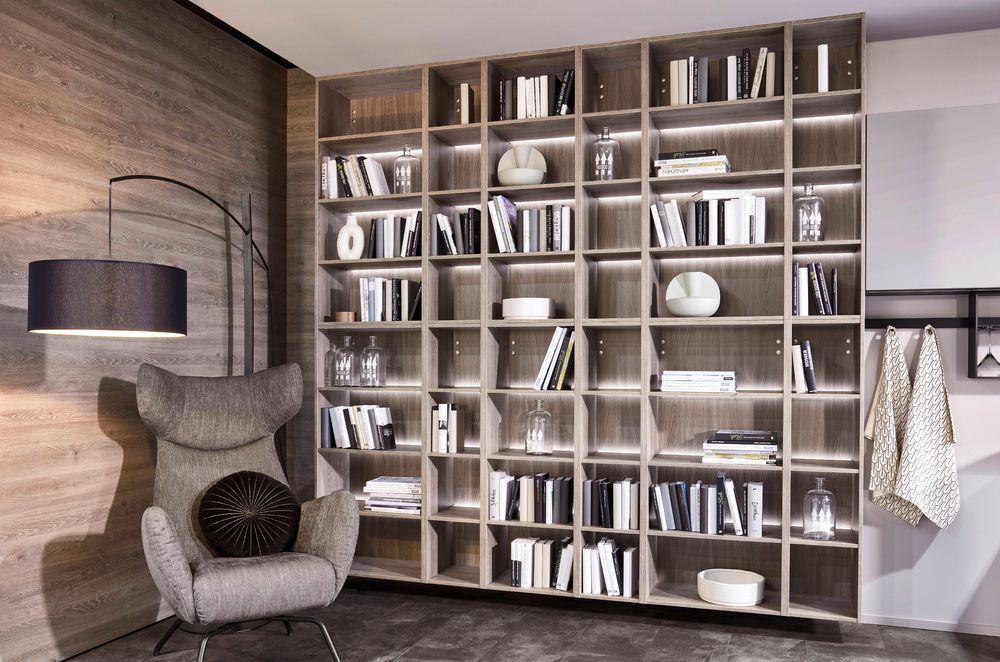 LED lighting can elevate and enhance a bookcase instantly, demonstrated with aplomb with this wall shelving system.