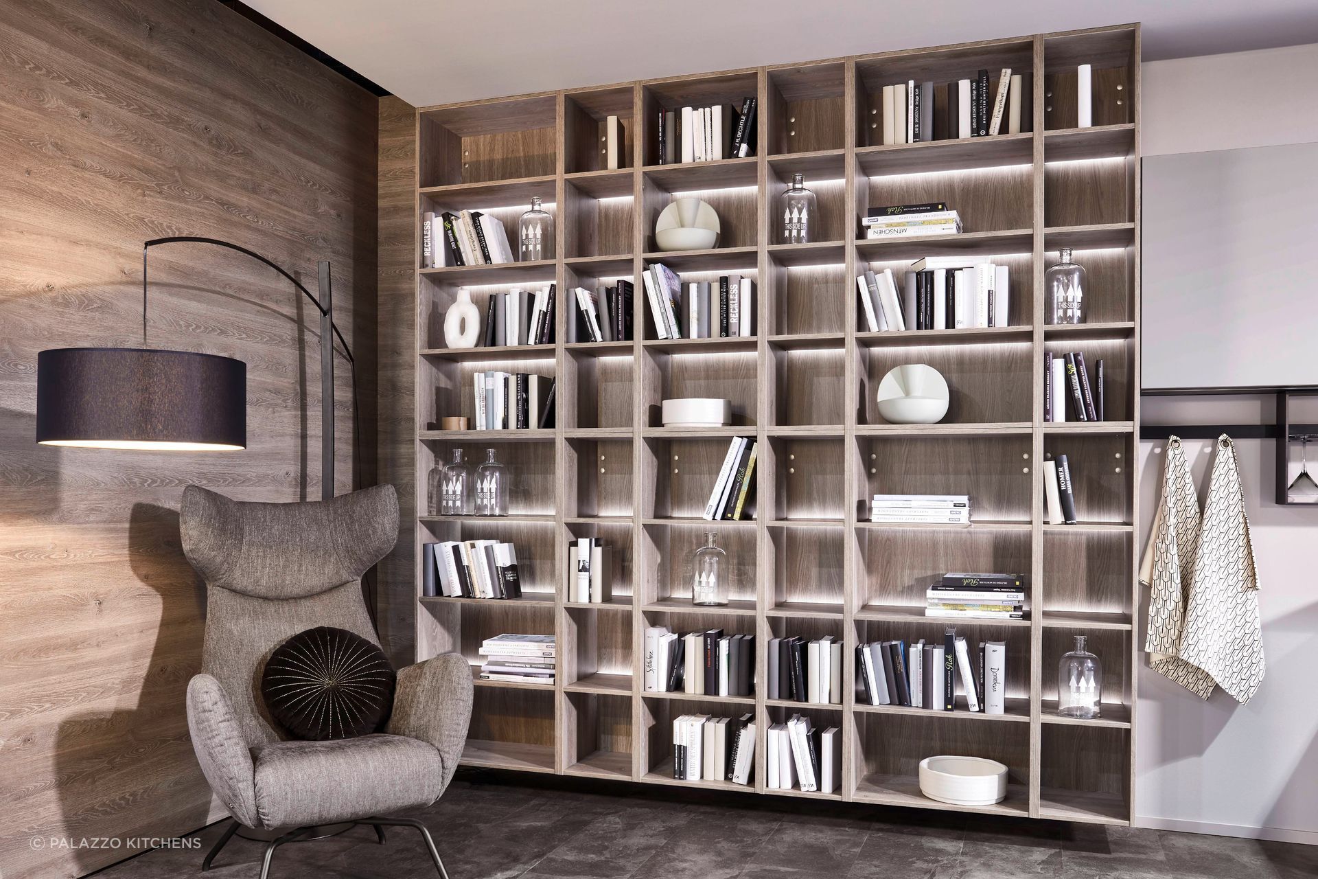 LED lighting can elevate and enhance a bookcase instantly, demonstrated with aplomb with this wall shelving system.