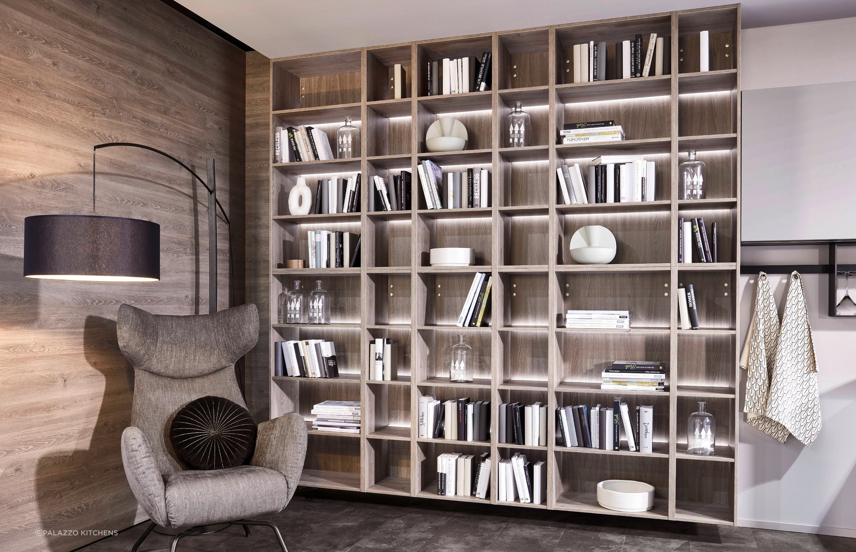 LED lighting can elevate and enhance a bookcase instantly, demonstrated with aplomb with this wall shelving system.