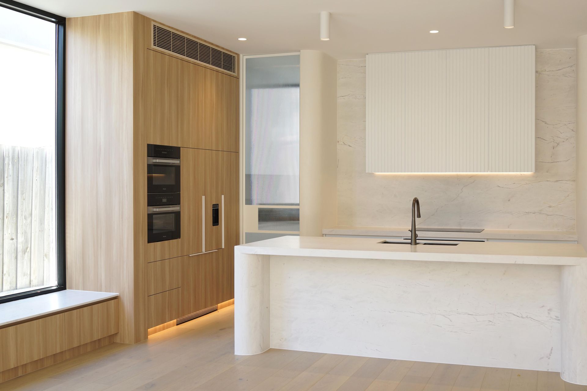 Combining classic and contemporary, this kitchen by Ilm Interiors showcases meticulous attention to detail.