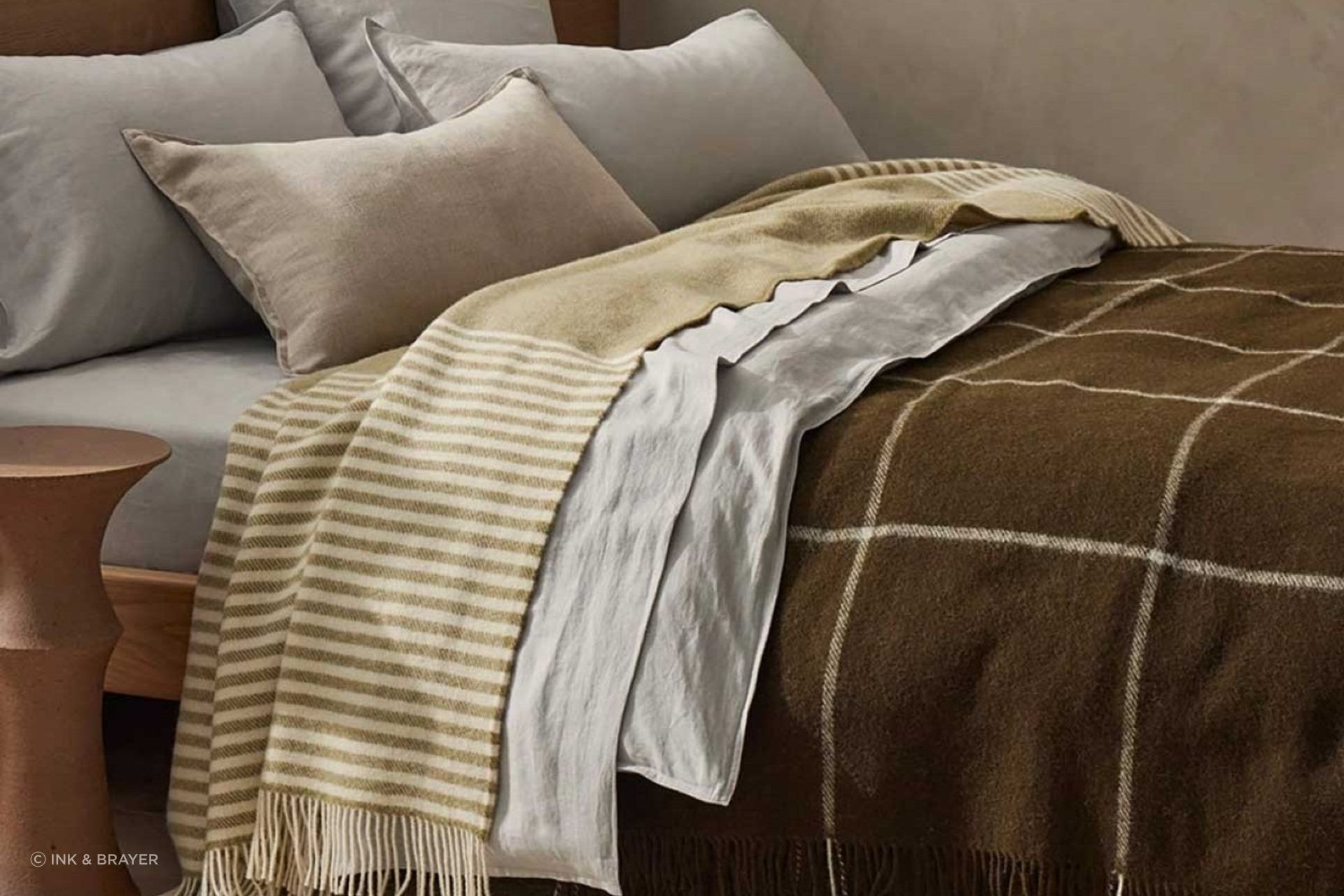 The Weave Home Catlins Wool Throw Blanket by Ink &amp; Brayer adds a beautiful accent of texture and colour.