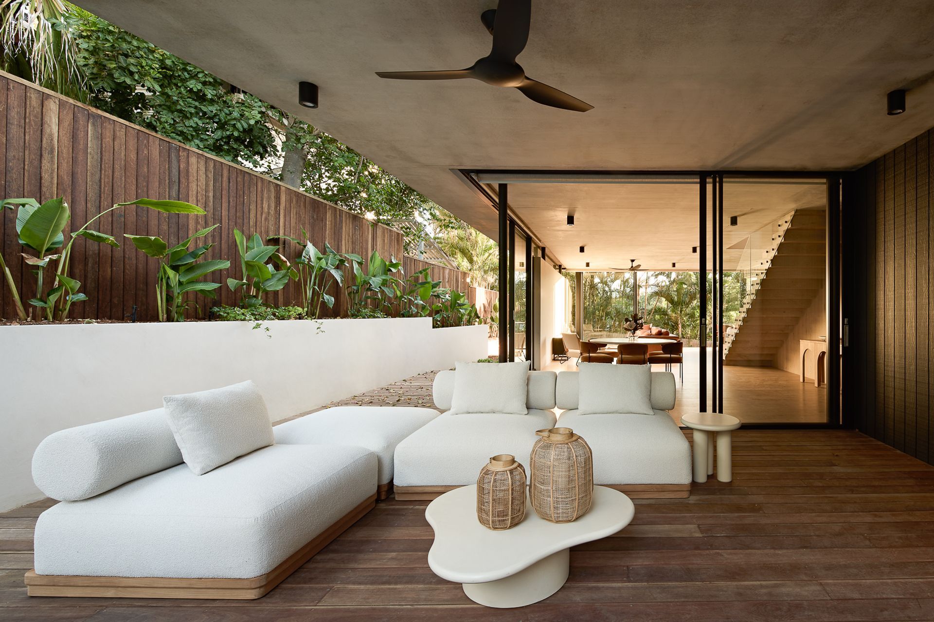 Wilflower Residence by Reitsma & Associates. It's not always necessary to have direct sunlight in an outdoor living space; using wide overhangs and screen planting can filter light in more softly.