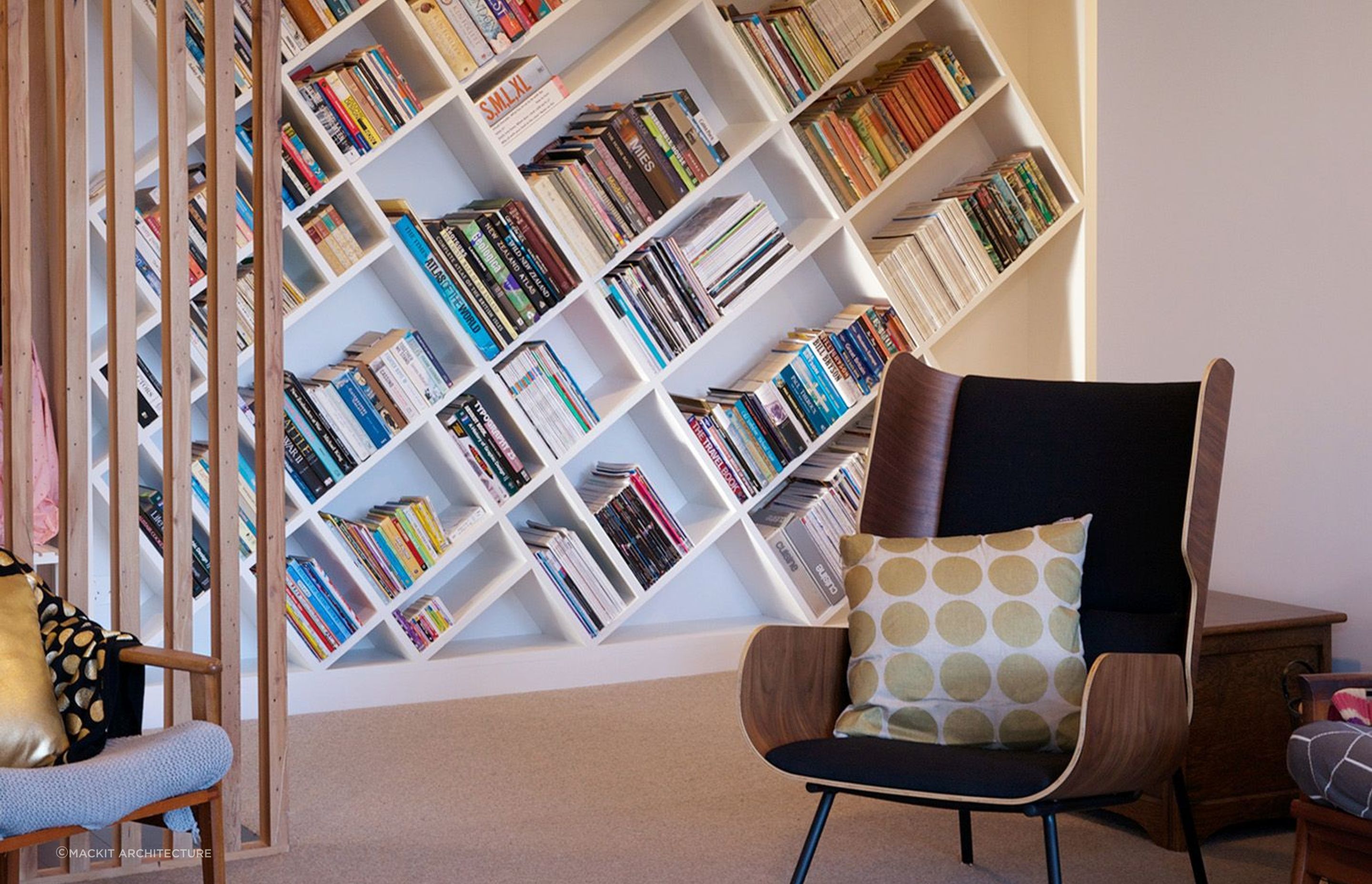 There are many ways to display your books and sometimes the design can help, seen here with this unique bookcase in this home in the Wairarapa.
