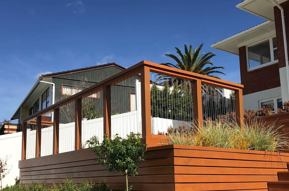 Wire and net fencing options can be more stylish than you might think, like these sophisticated Wire-infill balustrades.