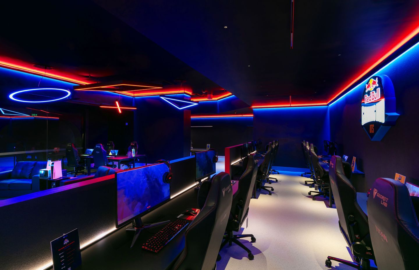 Above and below: UTS Red Bull gaming lounge; using gamer controller buttons lighting pendants were created to hang from the ceiling in their shapes: circle, X, and triangles. RGB colours were used to mimic the Red Bull logo.
