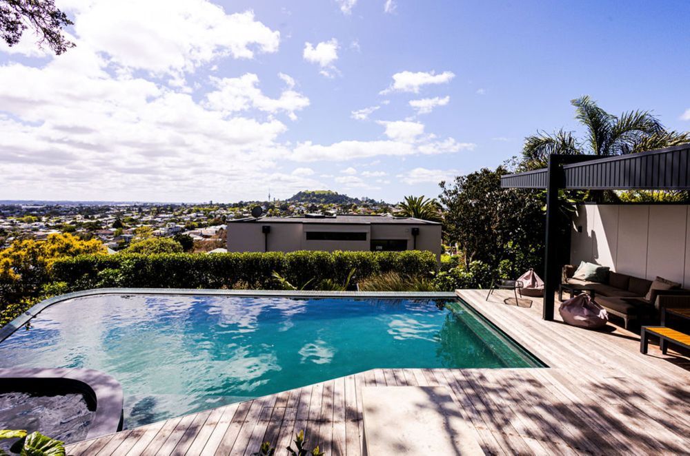 When it comes to home renovations it's important to consider the outdoor area. This pool and decking space built by Renovation Builders  transformed the backyard of an older home.