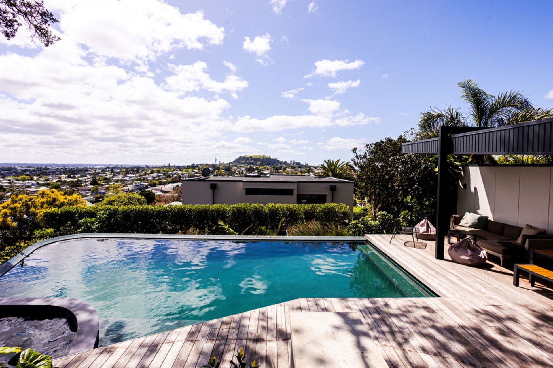 When it comes to home renovations it's important to consider the outdoor area. This pool and decking space built by Renovation Builders  transformed the backyard of an older home.