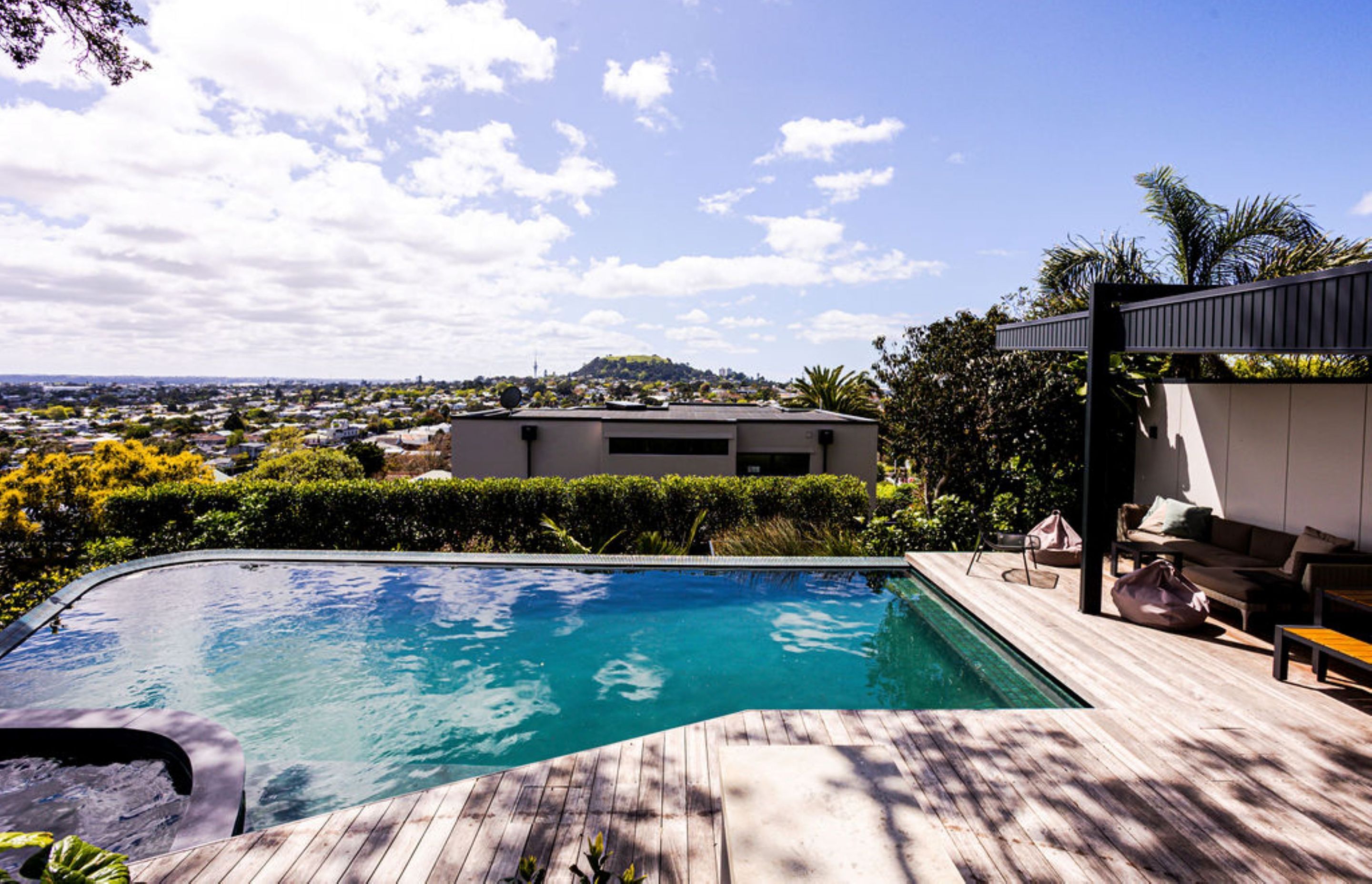 When it comes to home renovations it's important to consider the outdoor area. This pool and decking space built by Renovation Builders transformed the backyard of an older home.