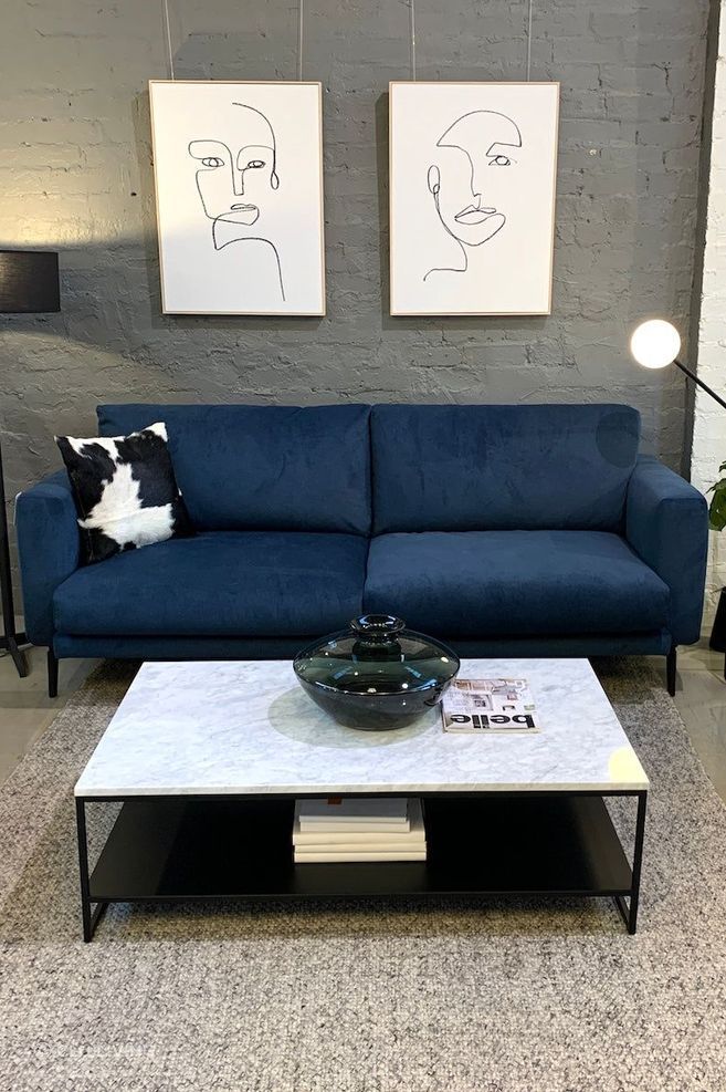 Rectangular coffee tables work well in small and large living rooms.