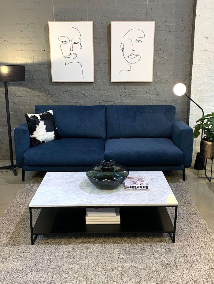 Rectangular coffee tables work well in small and large living rooms.