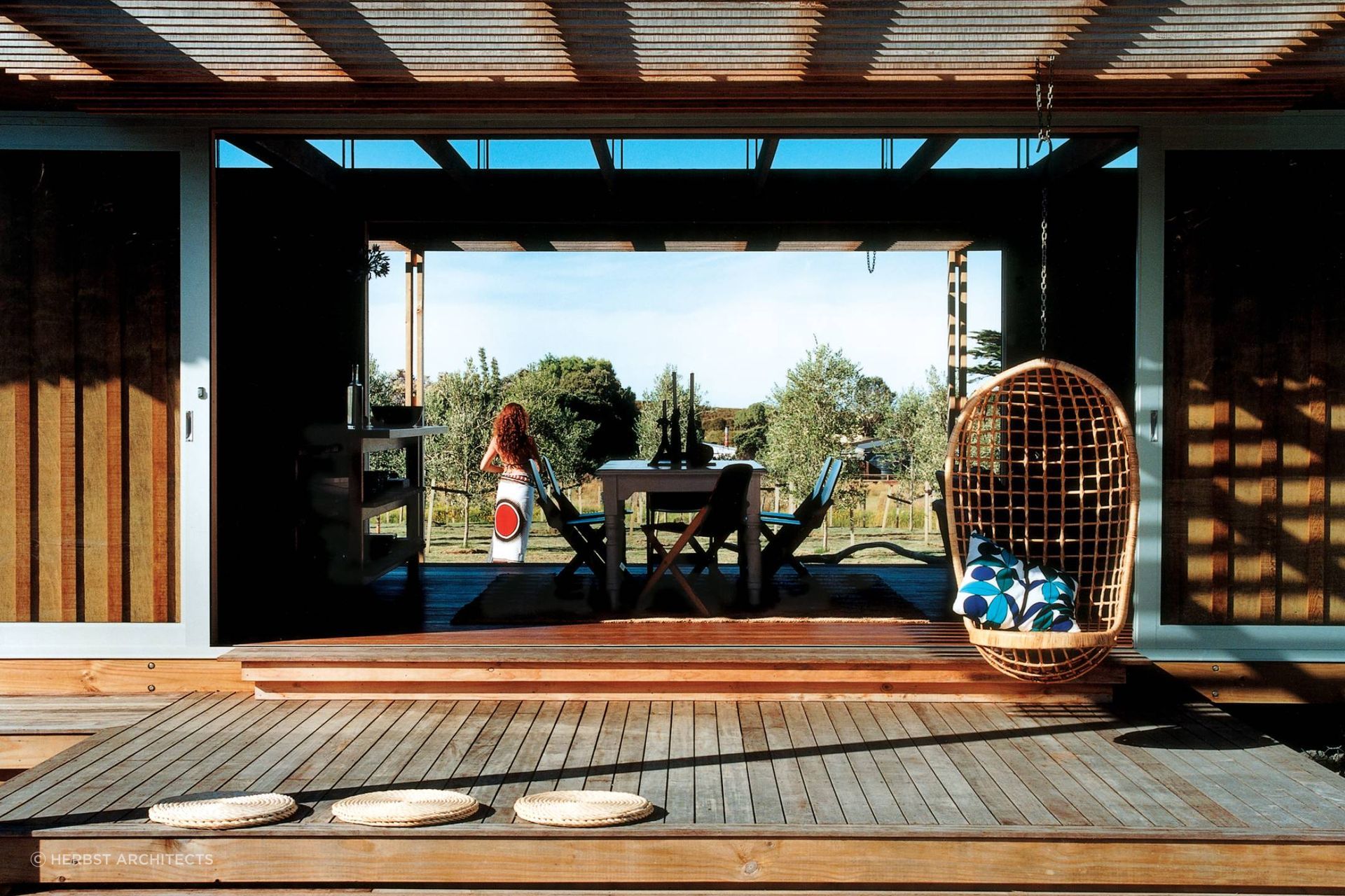 A hanging chair like this sets a very relaxing scene.