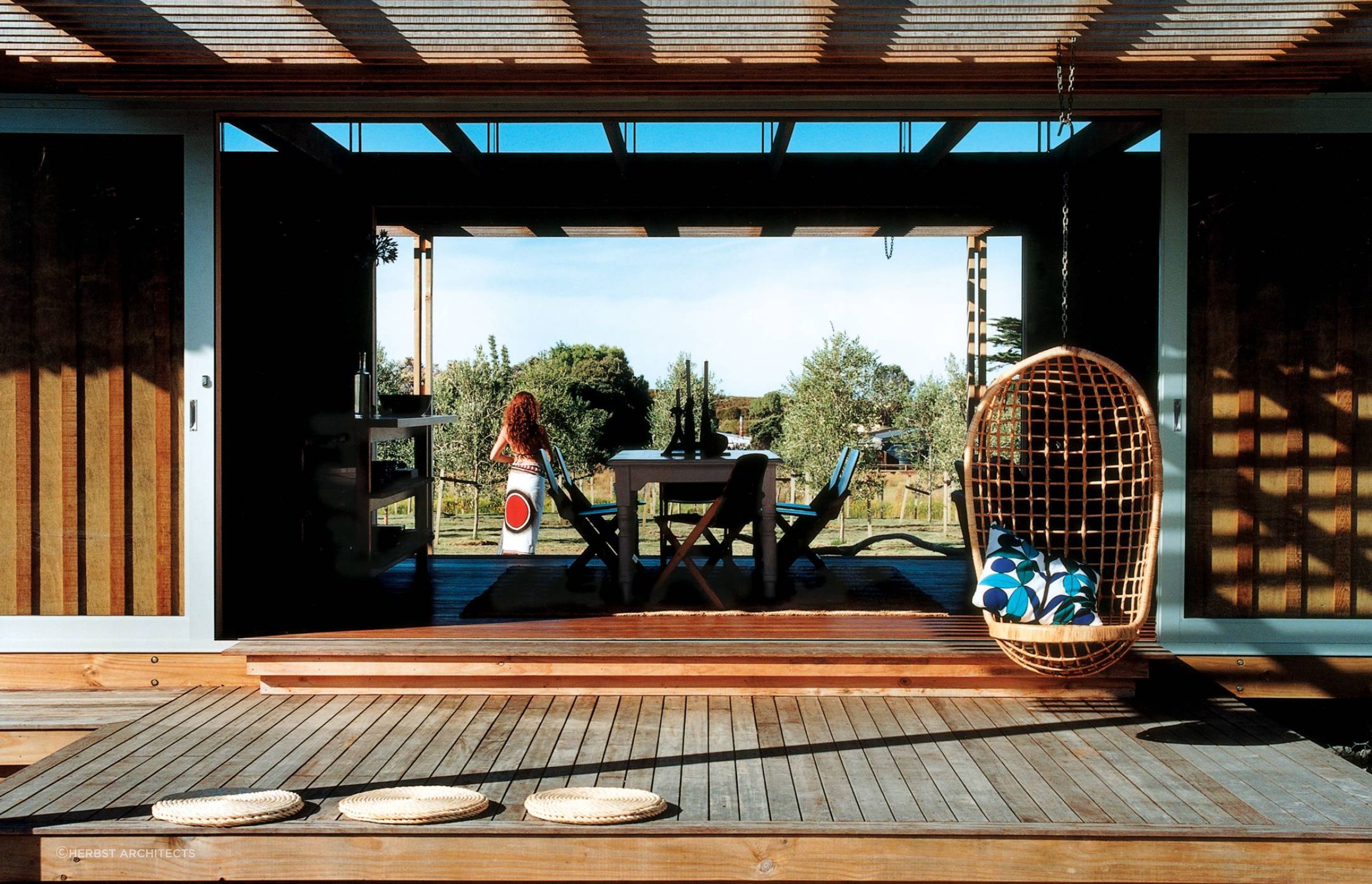 A hanging chair like this sets a very relaxing scene.