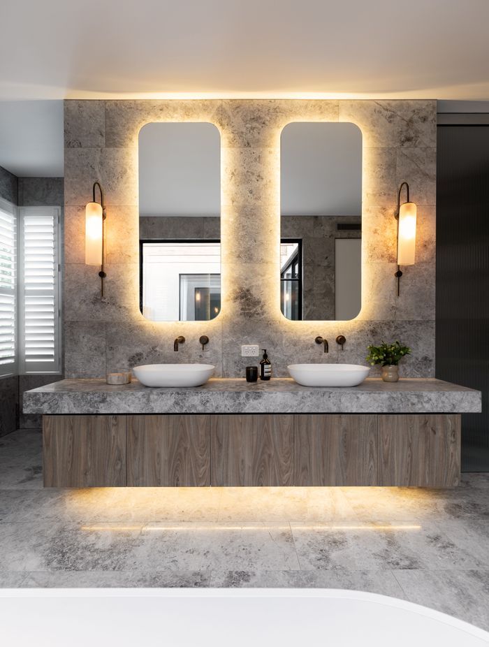 Stylish bathroom lights can help other key features stand out. Featured Project: Brighton Suite by Miri Interiors