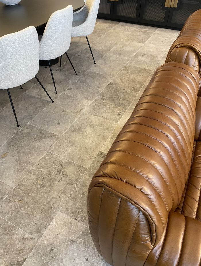 Marble tiles are suitable for kitchens and living spaces alike.