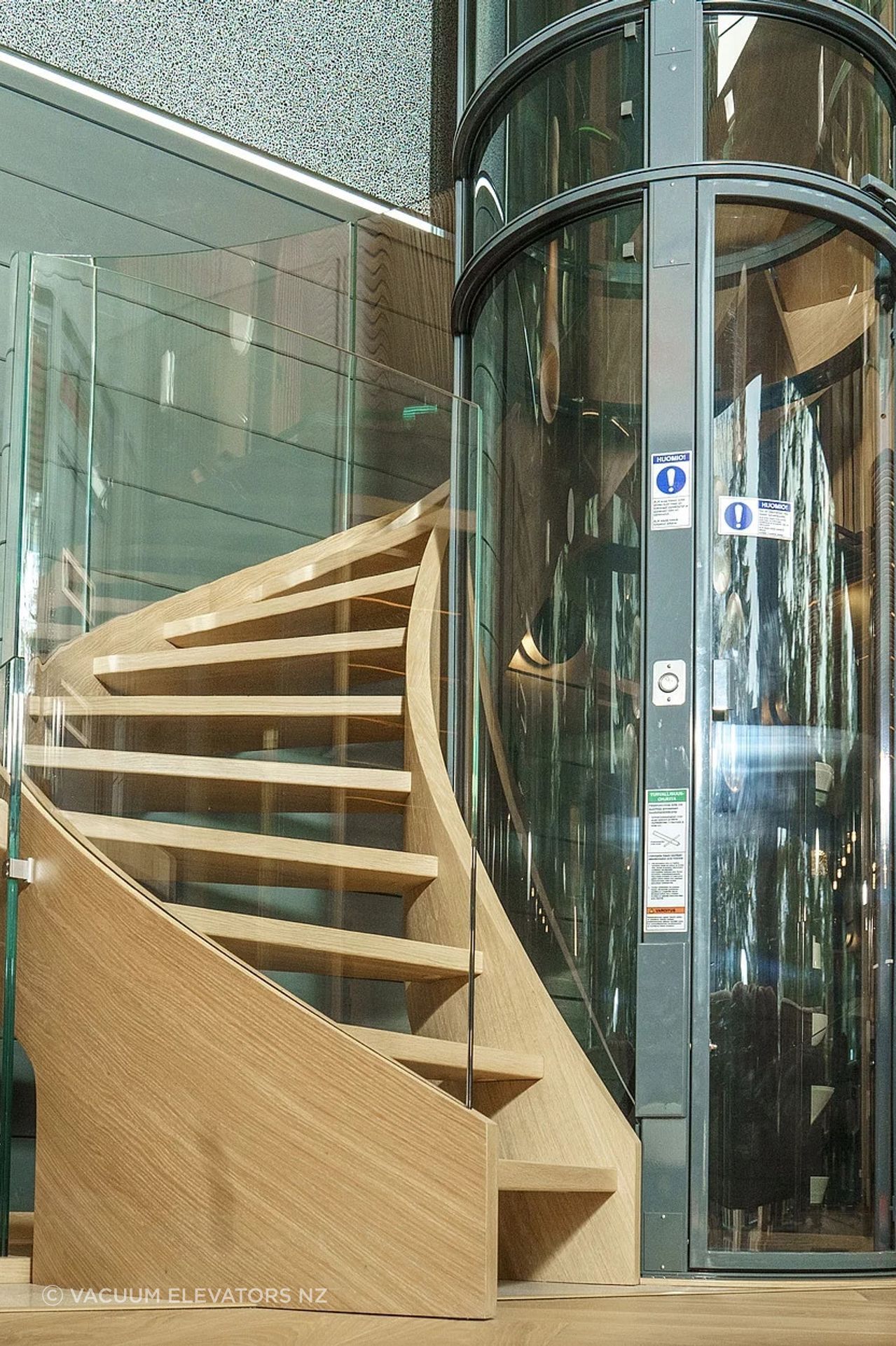 csmcurvedstaircasewithglassbalustradefloatingglassbridgesillerstairs5d73a8acd7f-ap-compressed-v3.jpg
