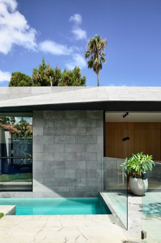 Bluestone is a versatile cladding choice, that can be used at the front and back of a building. Featured product: Bluestone Facades + Wall Cladding.