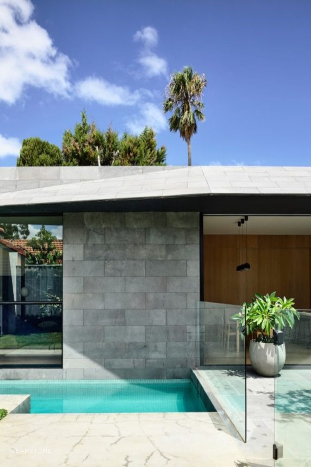 Bluestone is a versatile cladding choice, that can be used at the front and back of a building. Featured product: Bluestone Facades + Wall Cladding.