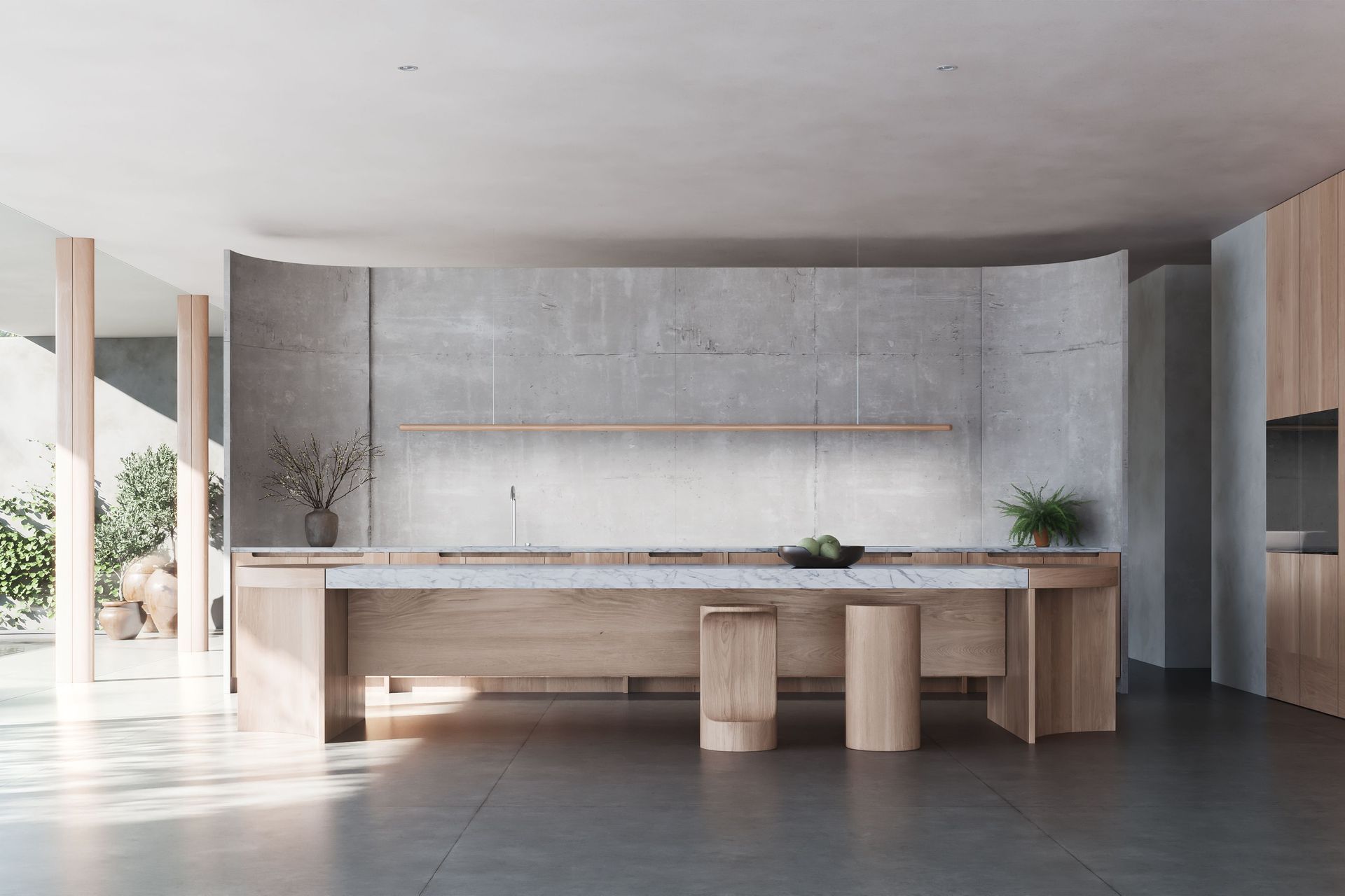 A sculptural in-situ concrete wall anchors the kitchen at Casa Sardinia, proving that minimal outcomes rely on early decisions and exacting execution. | Photo Credit: Mogamma