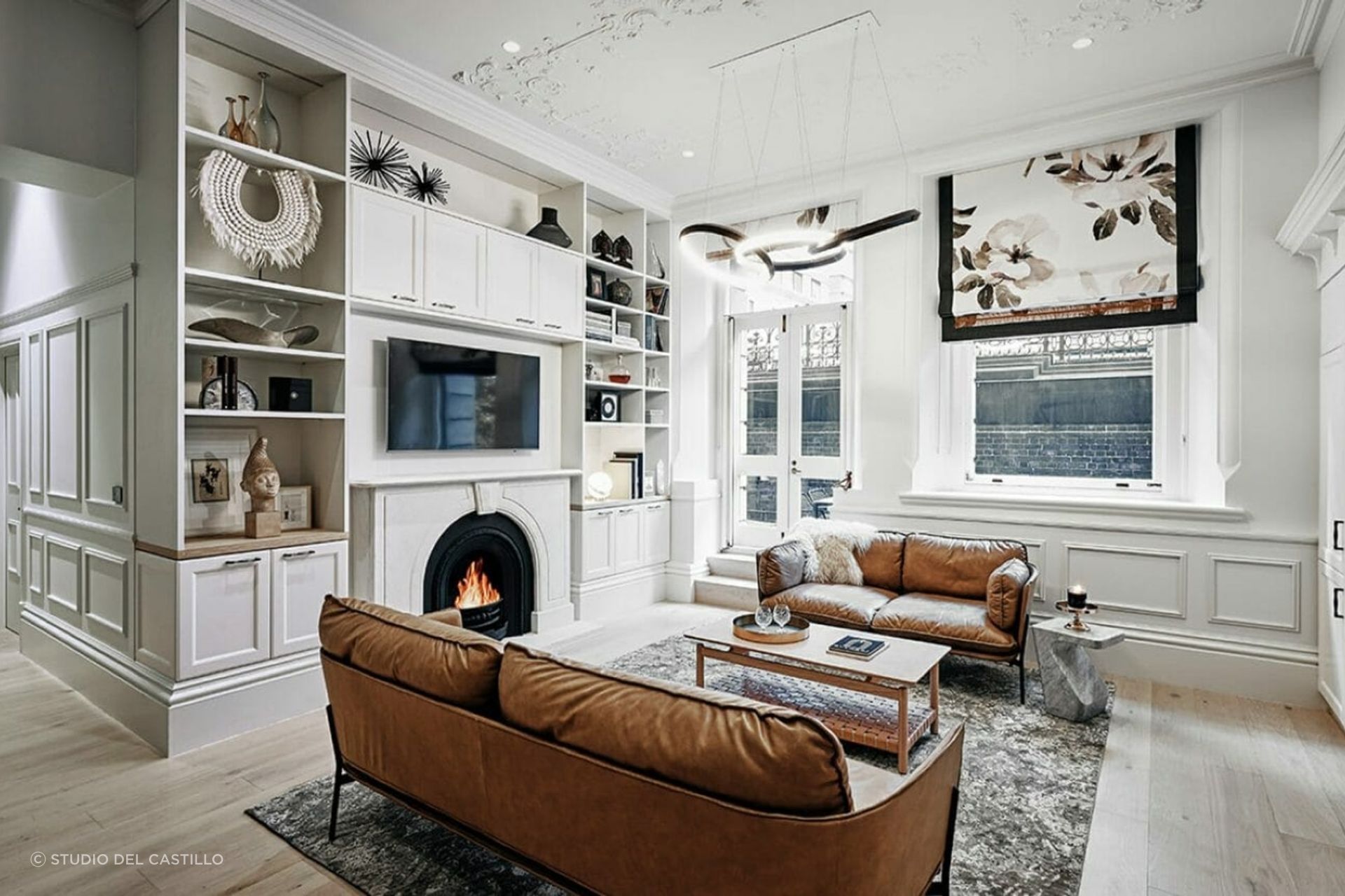 Adding floral blinds or curtains is a practical and straightforward way to start incorporating the Hamptons style into your living space. Project: The Grand by Studio Del Castillo.