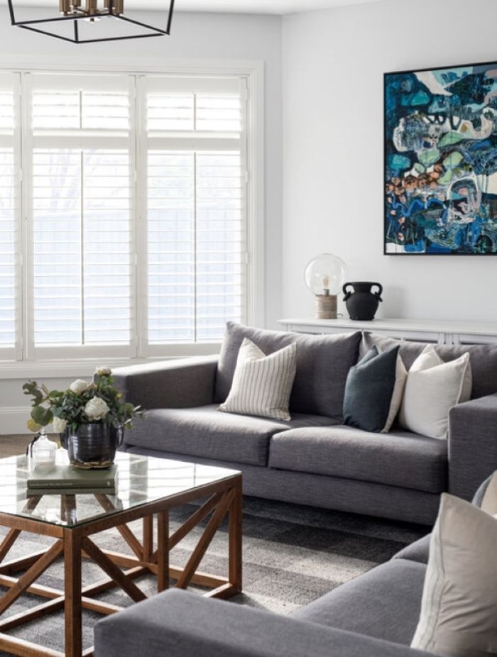 Wall art is commonplace in Hamptons style and coastal living spaces, particularly pieces infused with dark blues and greens. Photography: Dylan James