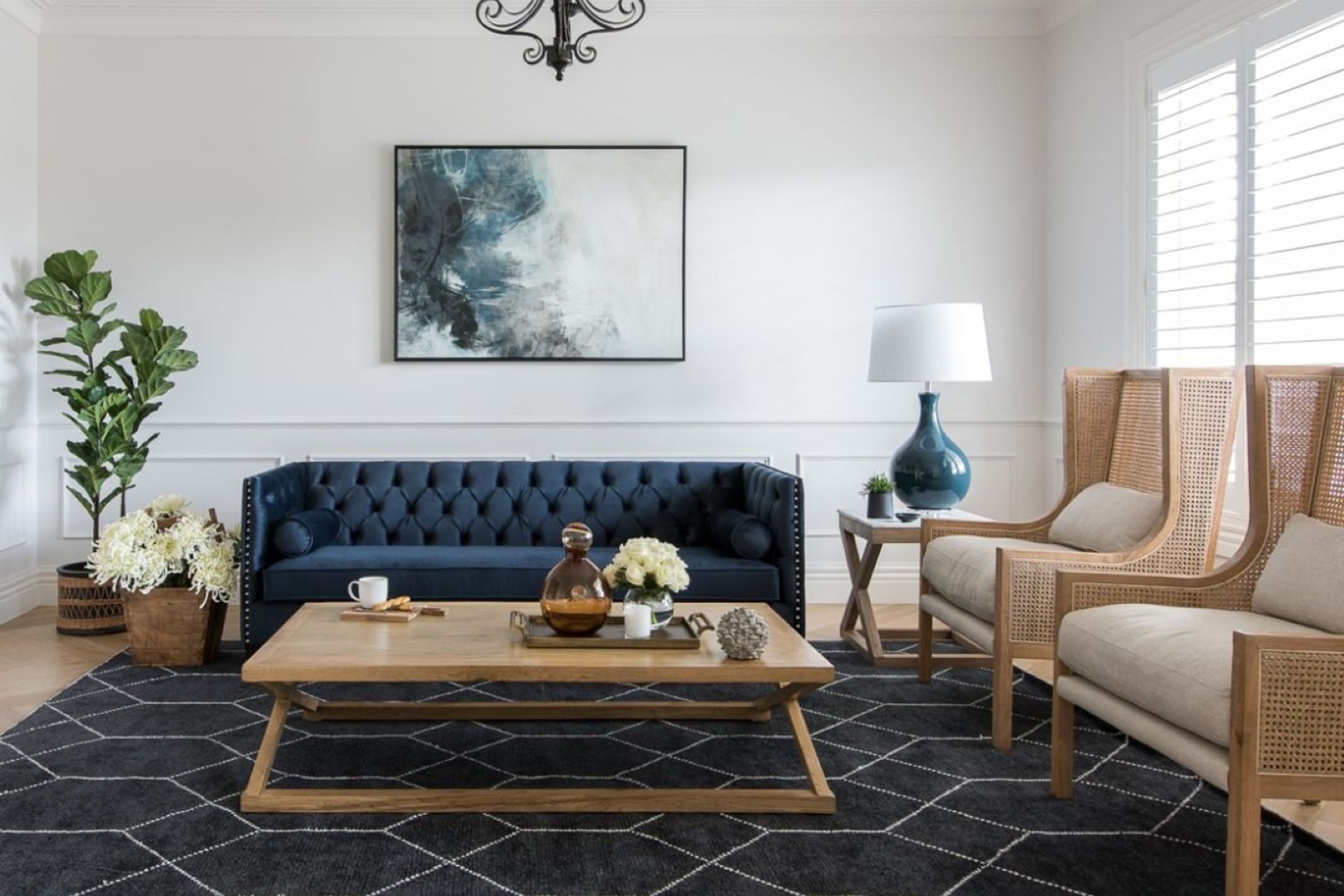 Beach-inspired wall art and accessories are the perfect finishing touches in this living room.