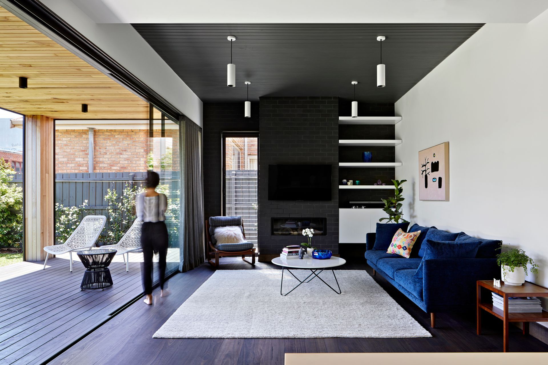 An open plan Hamptons style living space in a Californian bungalow located in Coburg North, Victoria. Photography: Tatjana Pitt