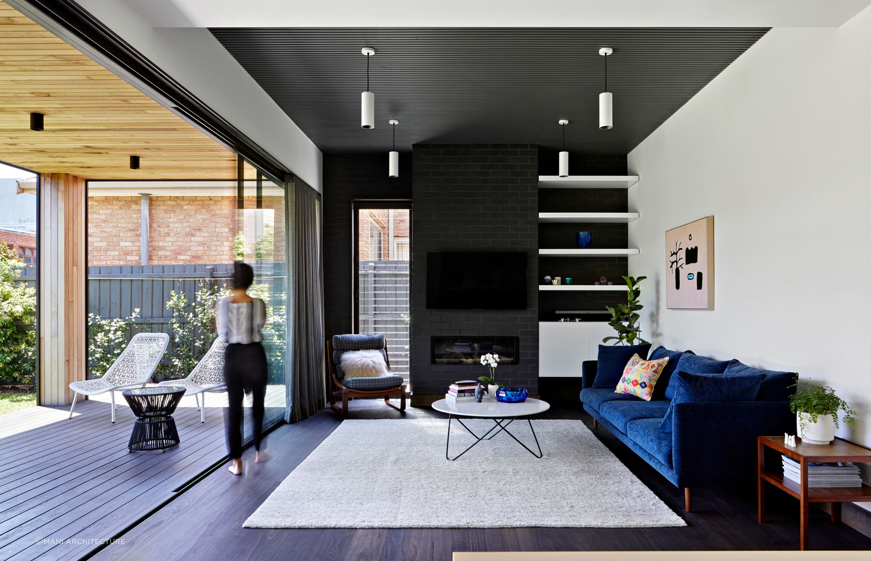 An open plan Hamptons style living space in a Californian bungalow located in Coburg North, Victoria. Photography: Tatjana Pitt