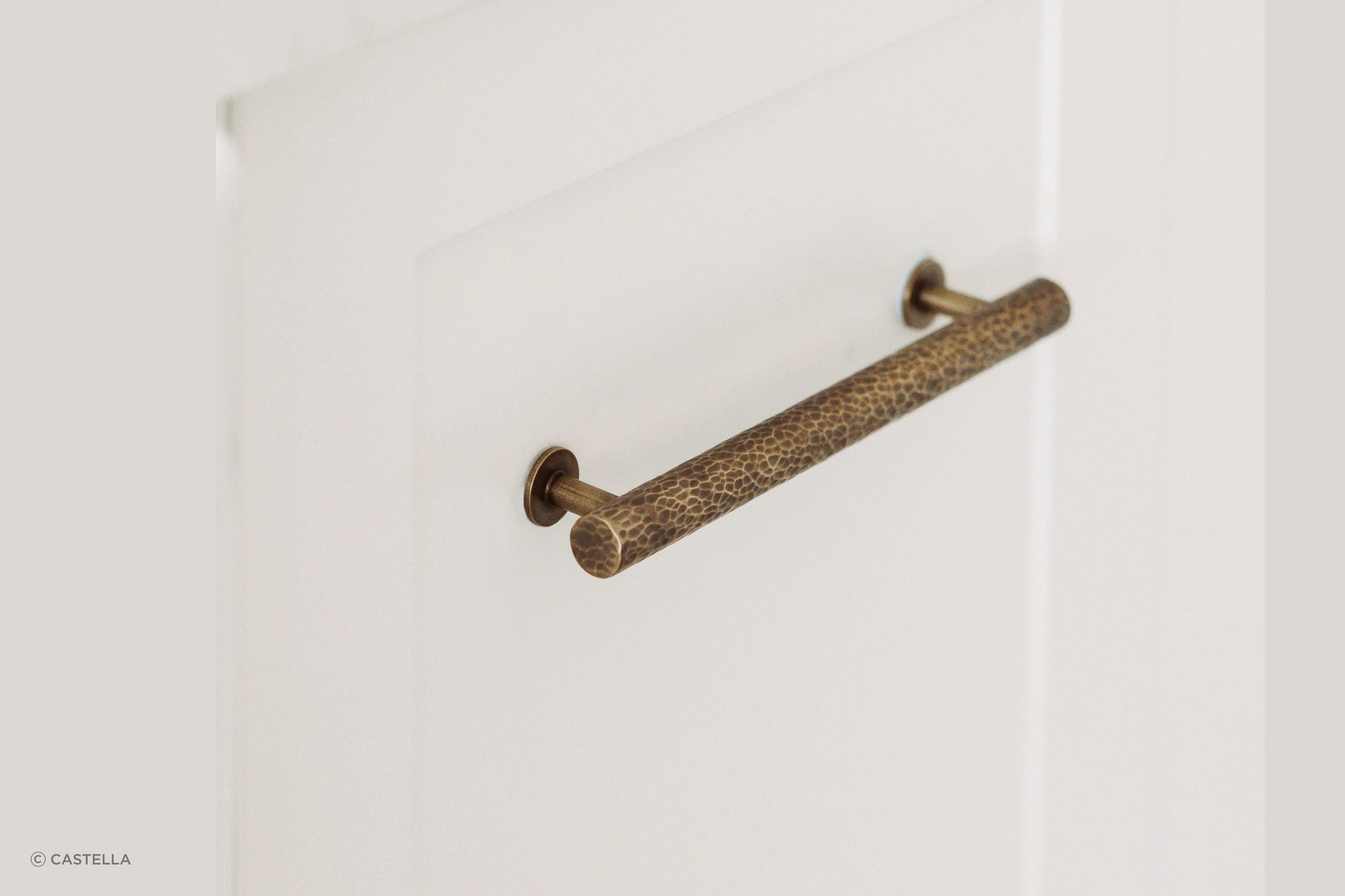 The Tarn handle in Aged Brass features a Hammered Finish