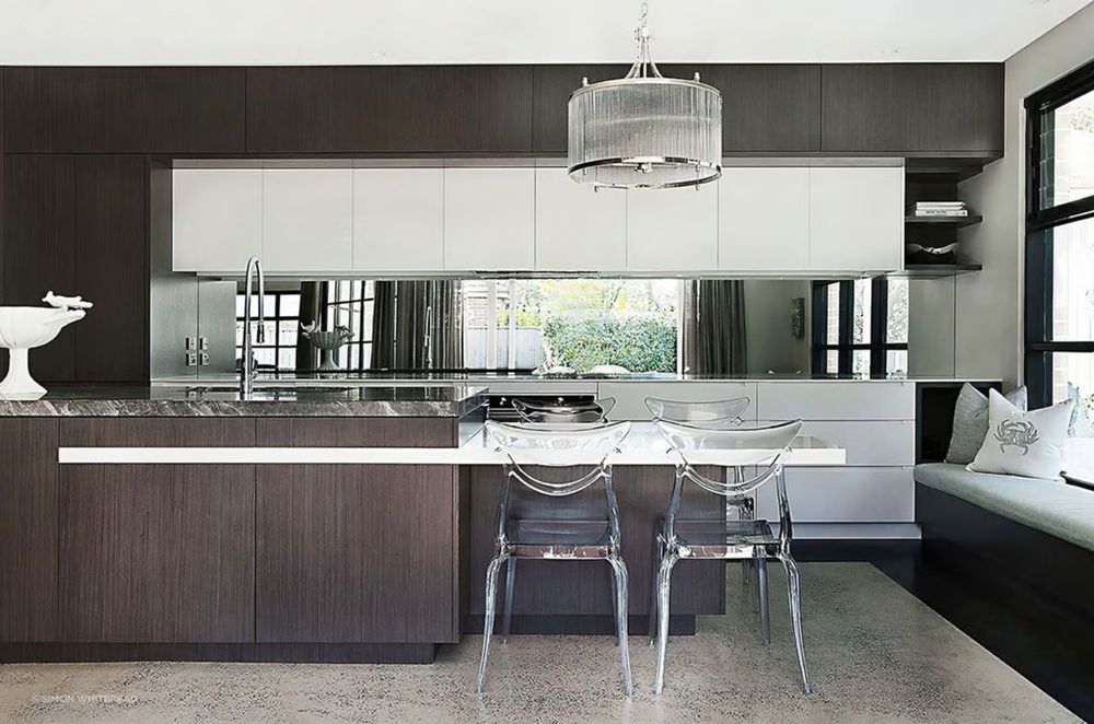 A stylish kitchen bench where seating has been considered in the design.