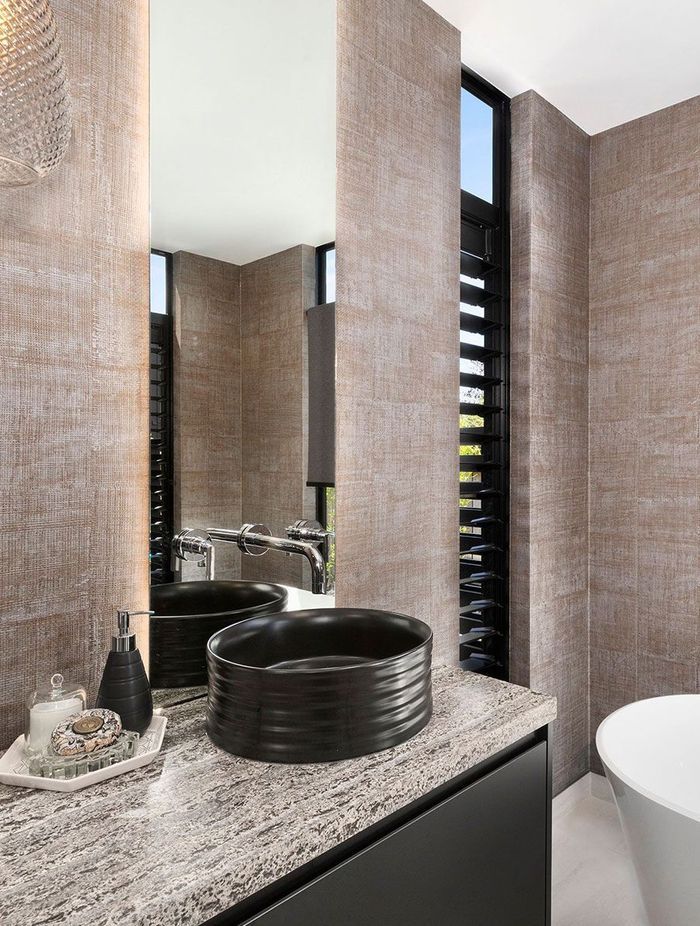 The LED backlight trend is a great way to add soft lighting to any bathroom.