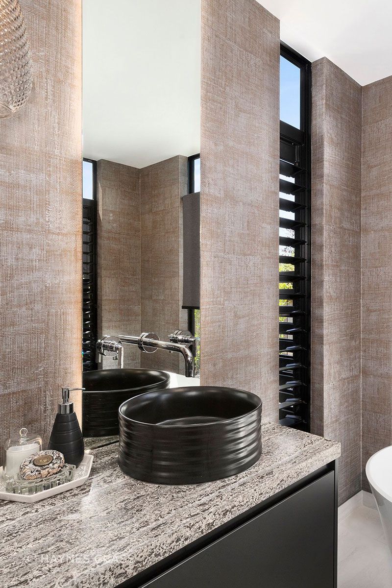The LED backlight trend is a great way to add soft lighting to any bathroom.