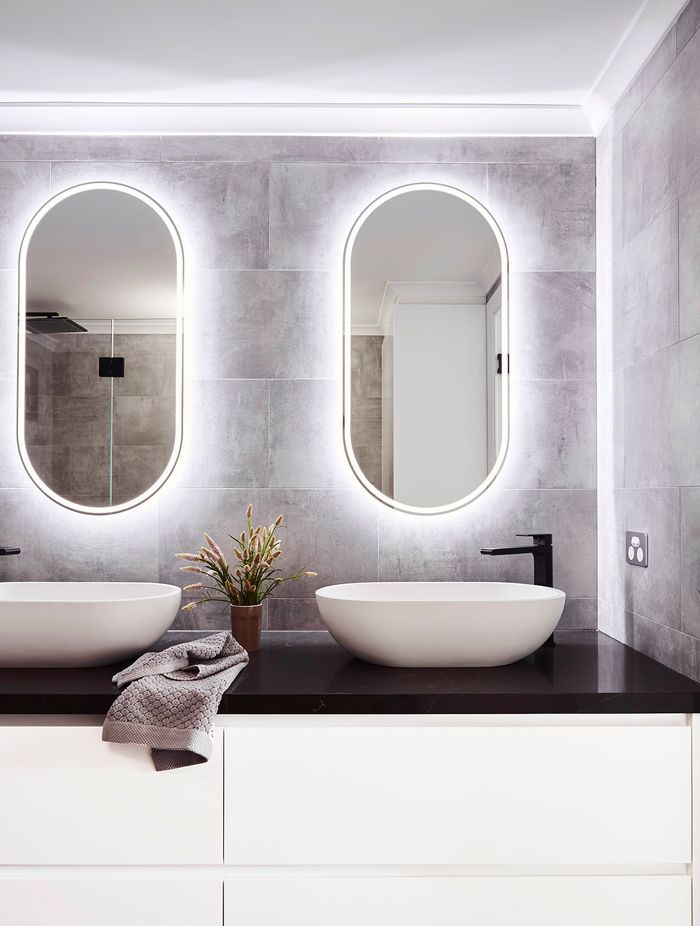Light in your bathroom can come from a variety of sources, including mirrors. Manly Bathroom Project by Collaroy Kitchen Centre